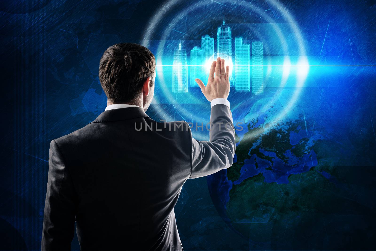 Businessman in suit stand back and touch digital background with wire-frame skyscrapers. Elements of this image furnished by NASA