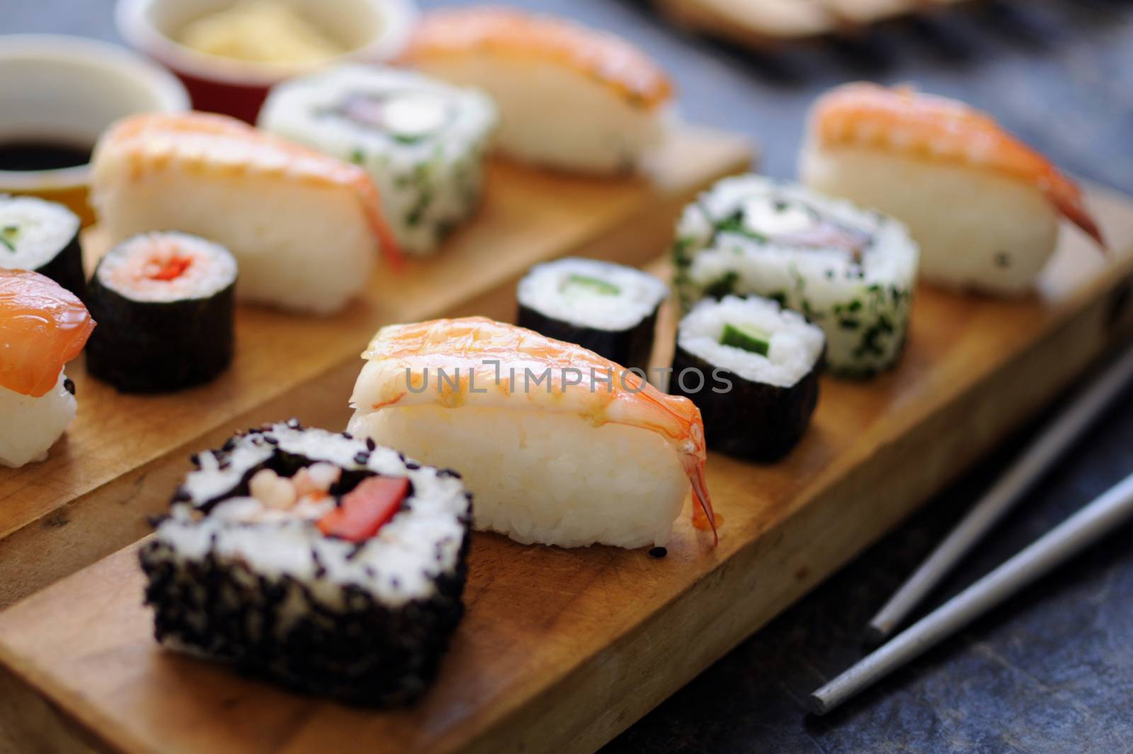 Sushi selection including prawns, salmon and vegetables with rice 