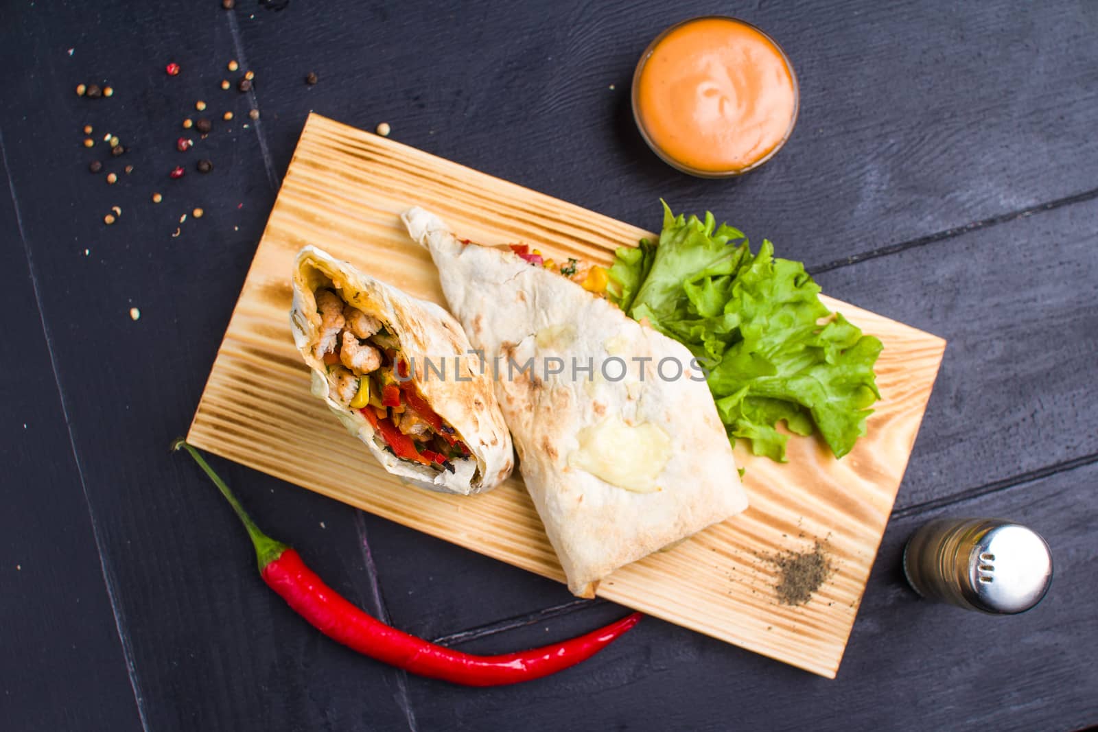 Homemade fries on a table with ingredients and cutlery around. Concept: healthy food, diet, fastfood. 