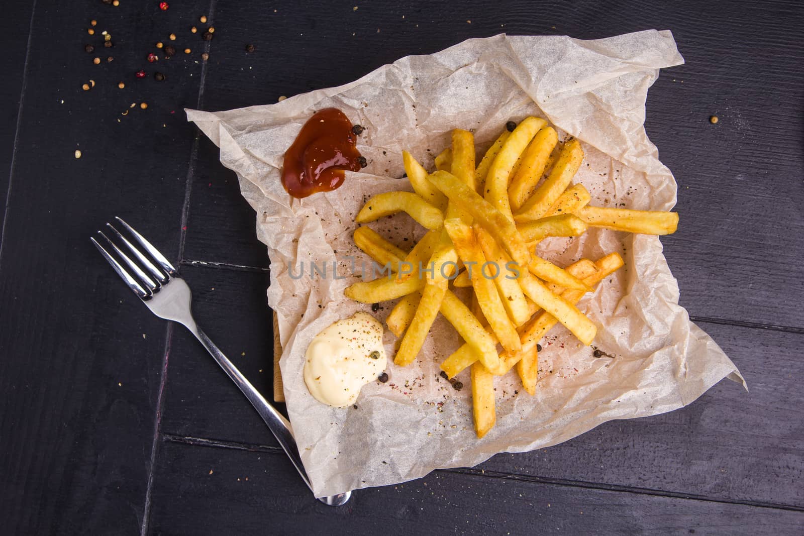 Homemade fries on a table by mrakor