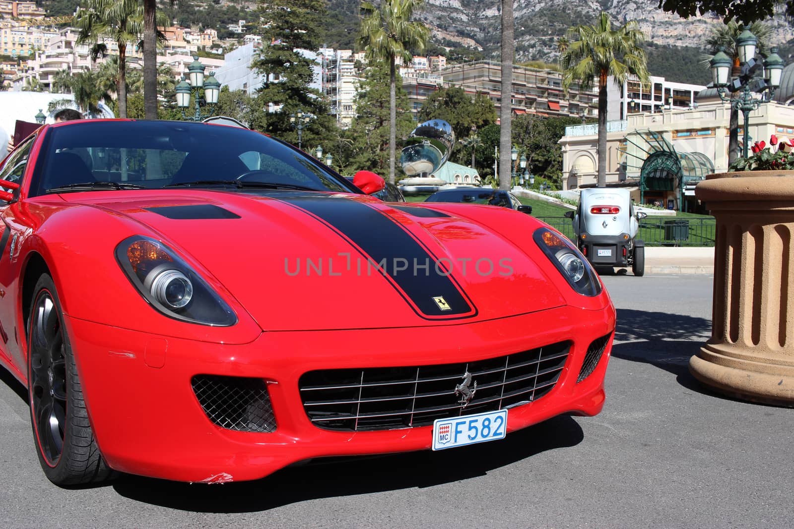 Monte-Carlo, Monaco - March 9, 2016: Red Ferrari 430 Scuderia Parked in Front of the Monte-Carlo Casino in Monaco