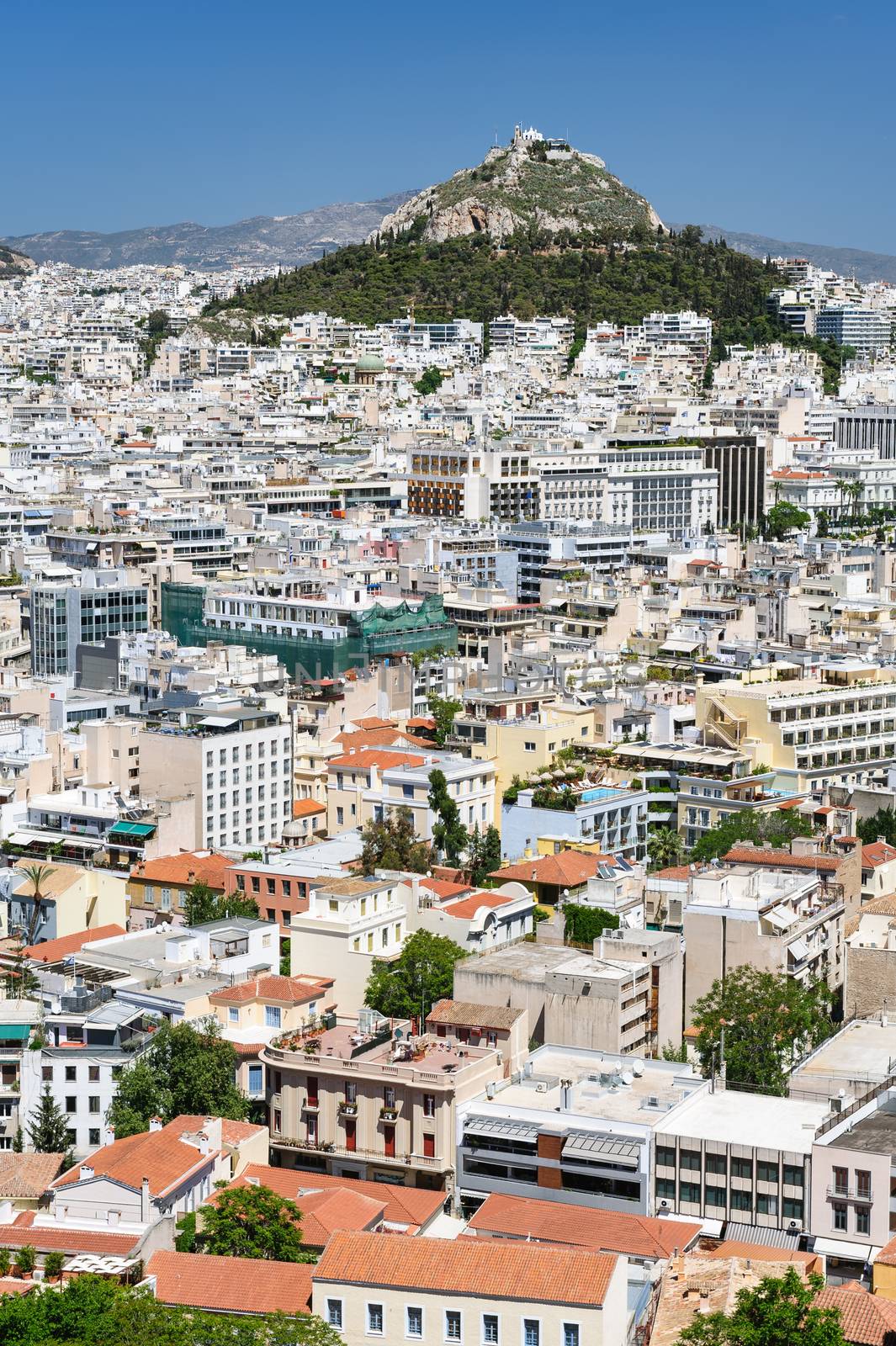Cityscape of Athens, Greece with Lycabettus Hill at background