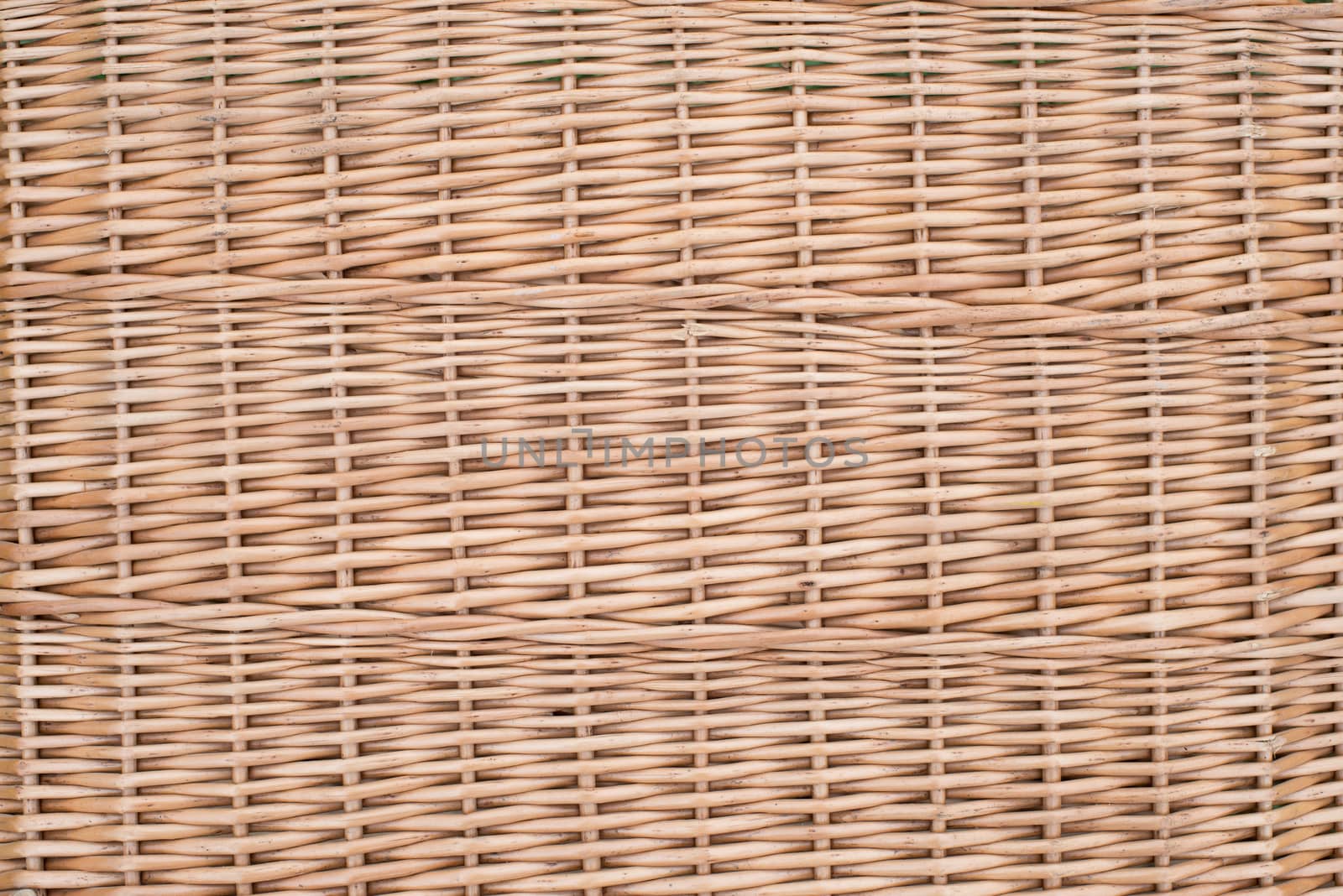 Wicker furniture light brown textured  background by skrotov