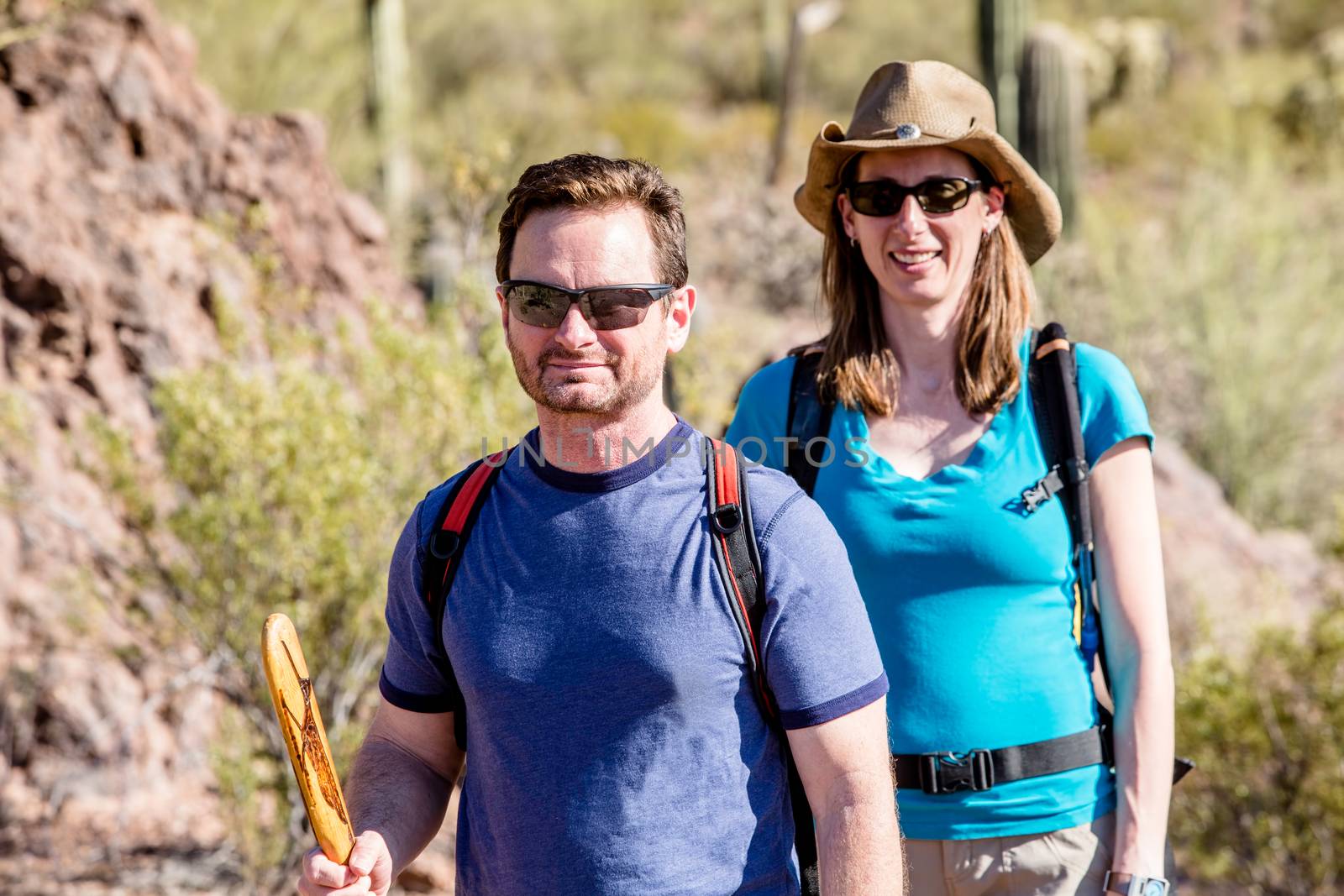 Couple desert hiking in the American Southwest