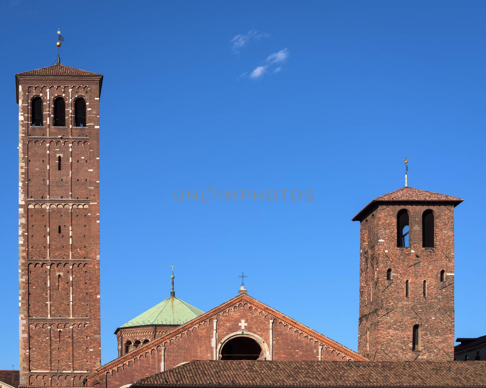 Facade of Saint Ambrose cathedral in Milan, Italy