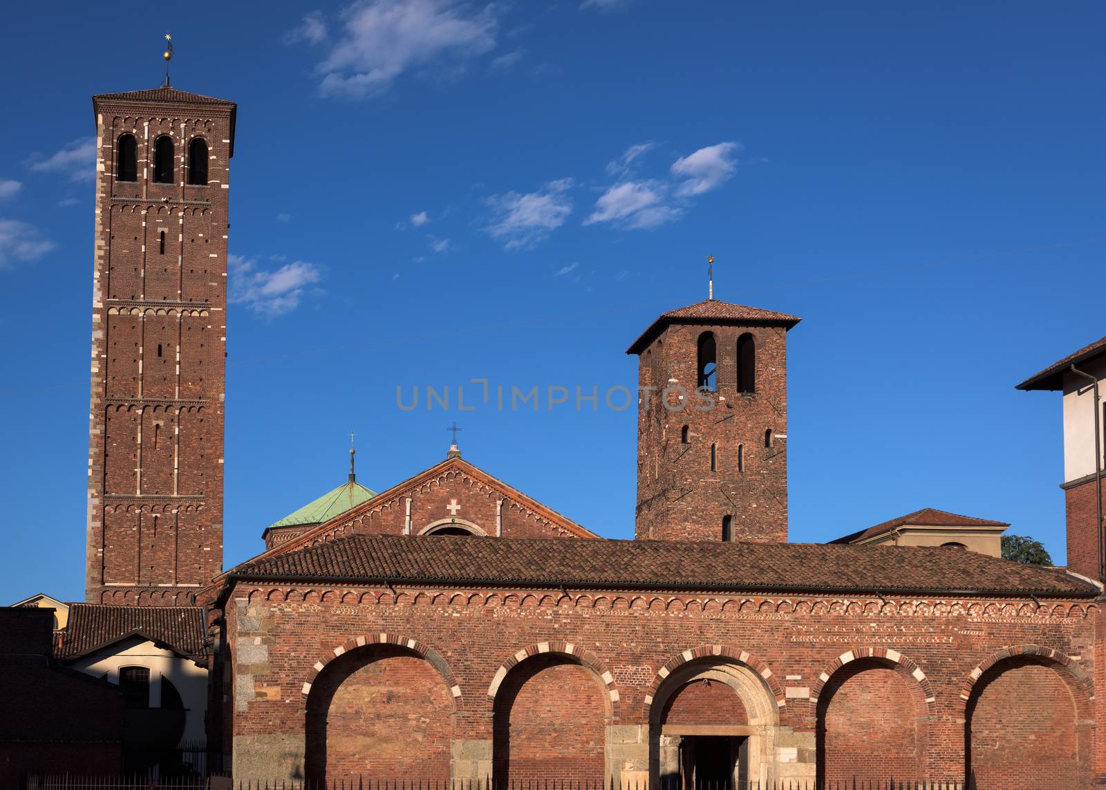 Facade of Saint Ambrose cathedral in Milan, Italy