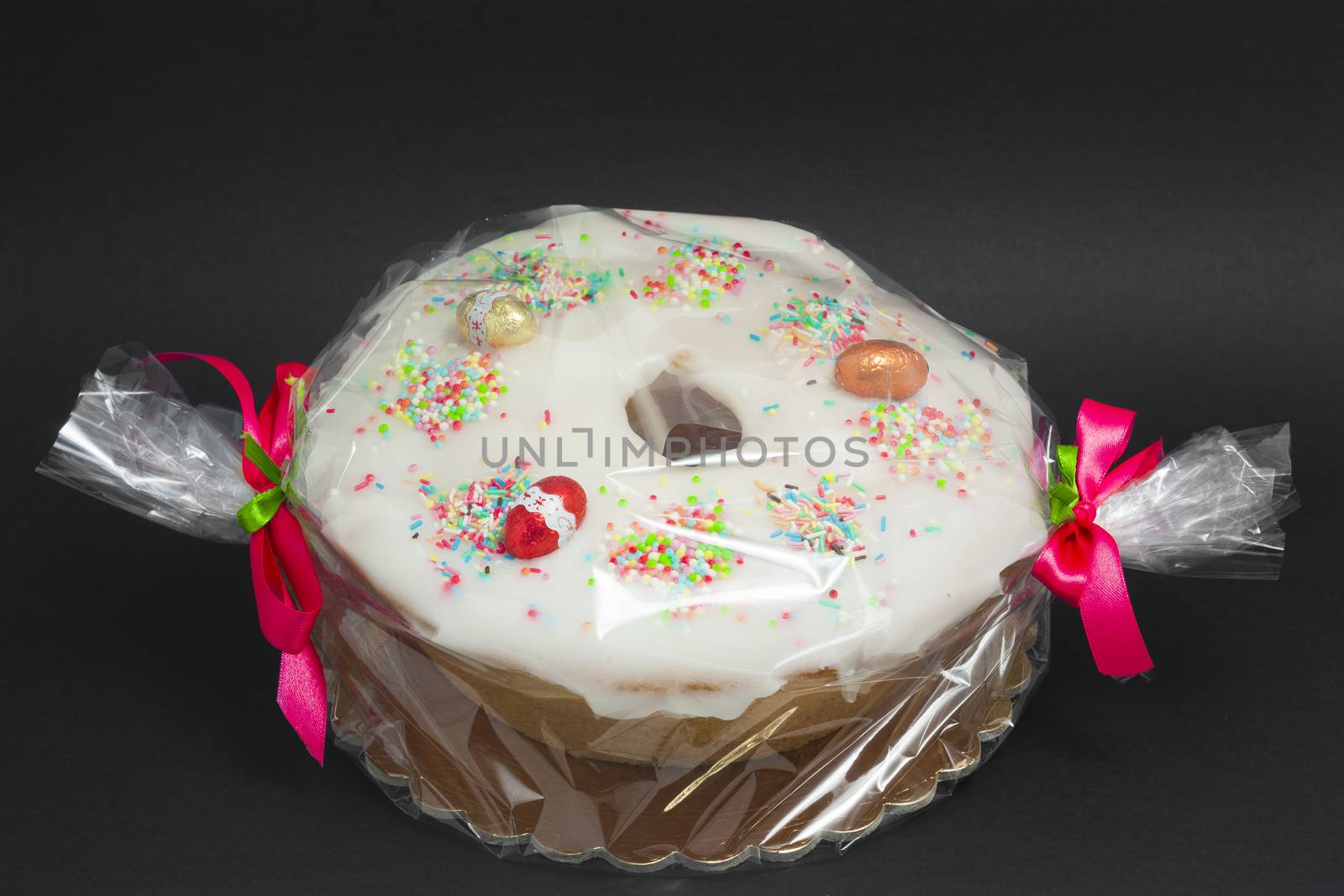Italian traditional cake with icing sugar and chocolates by mailos