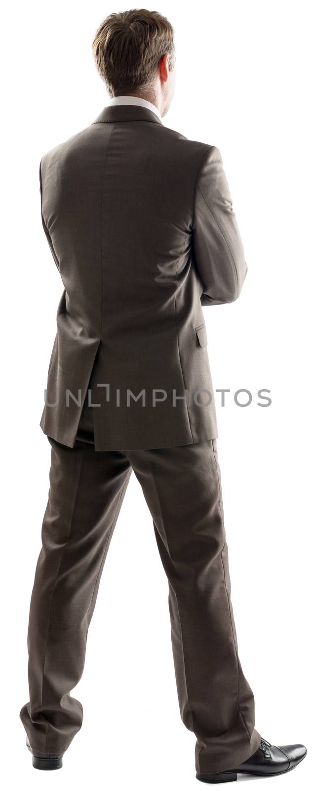 Rear view image of young male business executive isolated on white background