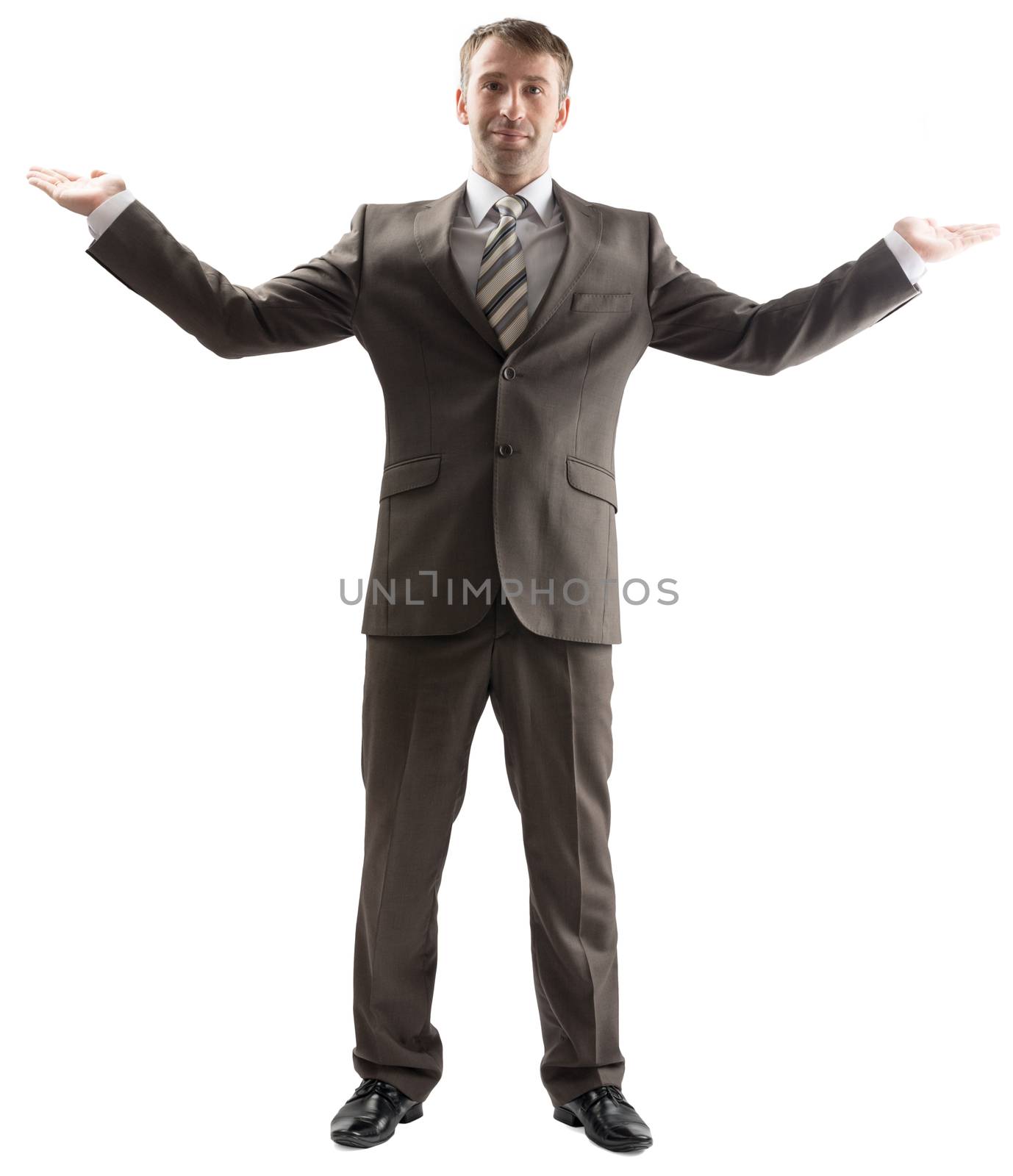 Isolated business man with arms up on white