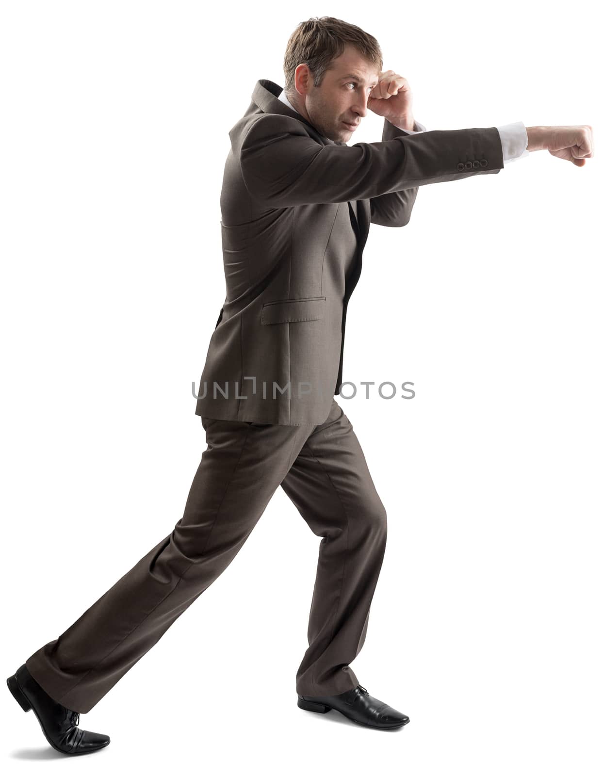 Angry businessman in formal outfit hitting by cherezoff