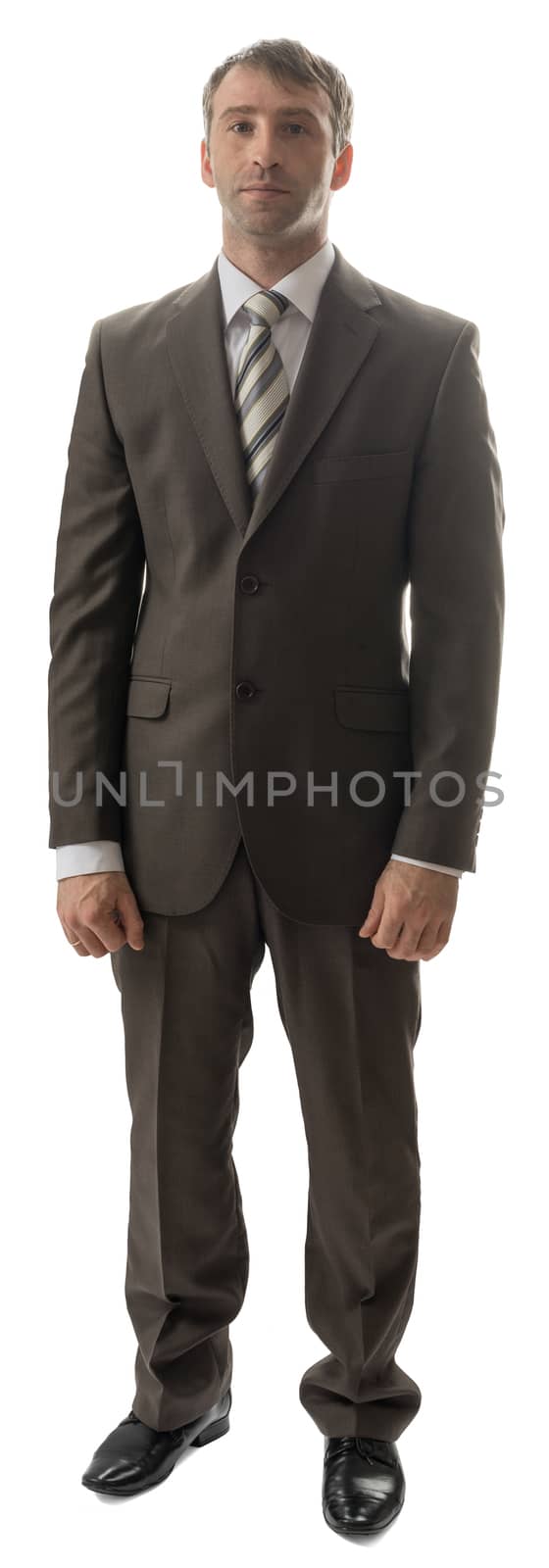 Confidence businessman in suit and tie looking at camera isolated on white background