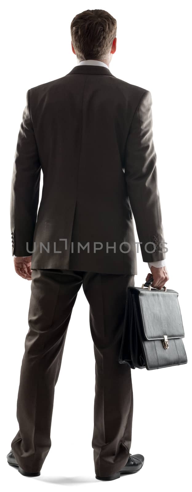 Back view of young businessman standing with briefcase isolated on white background