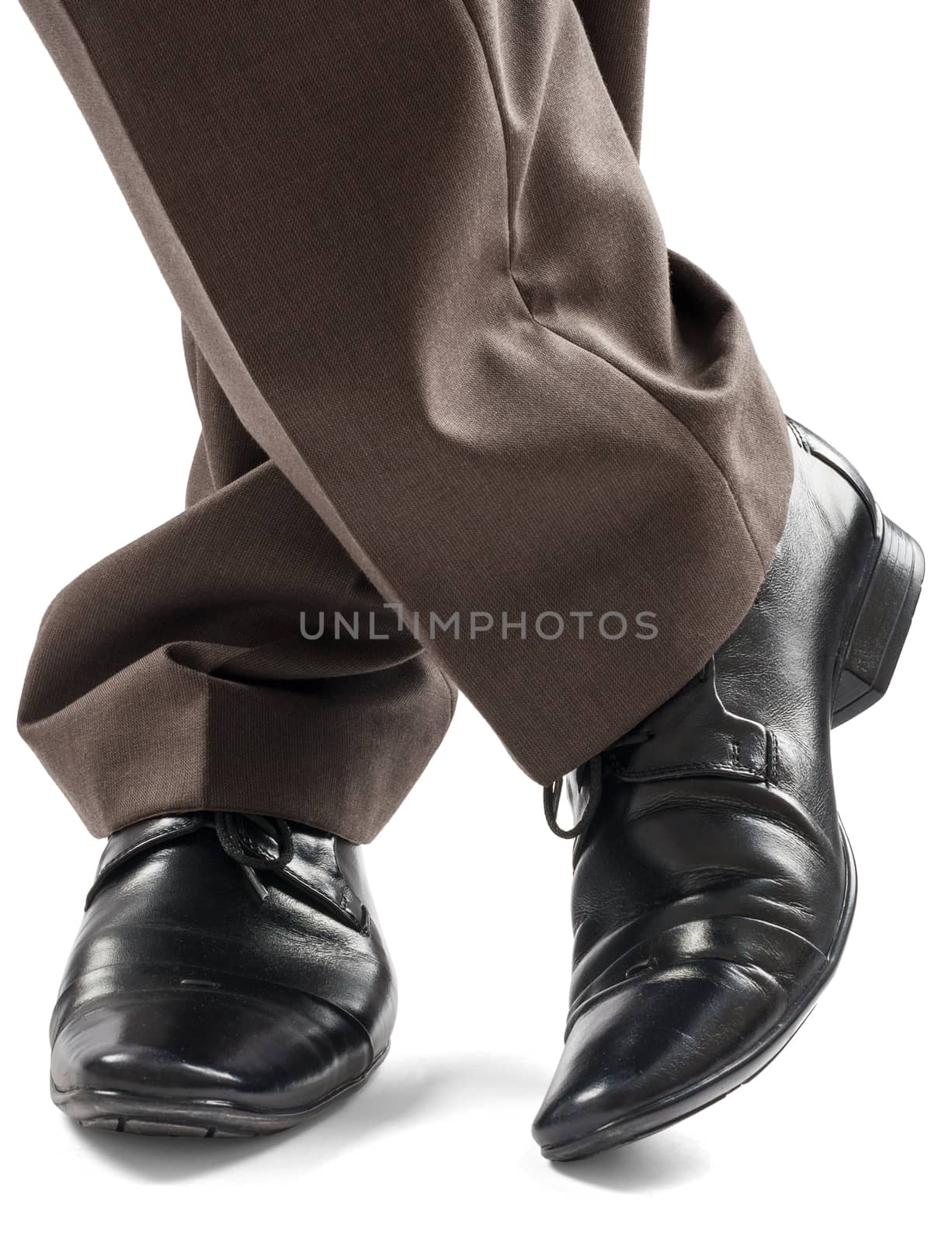 Businessman standing on floor, closeup of feet