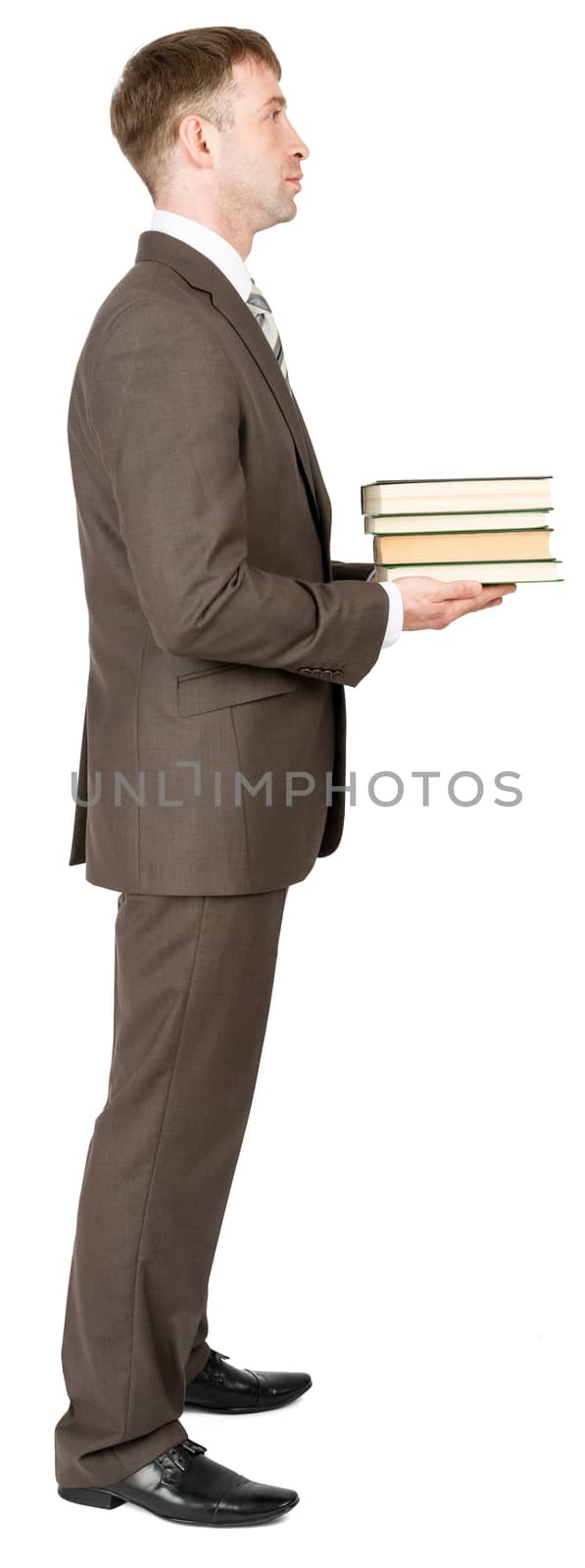 Businessman holding books isolated on white background