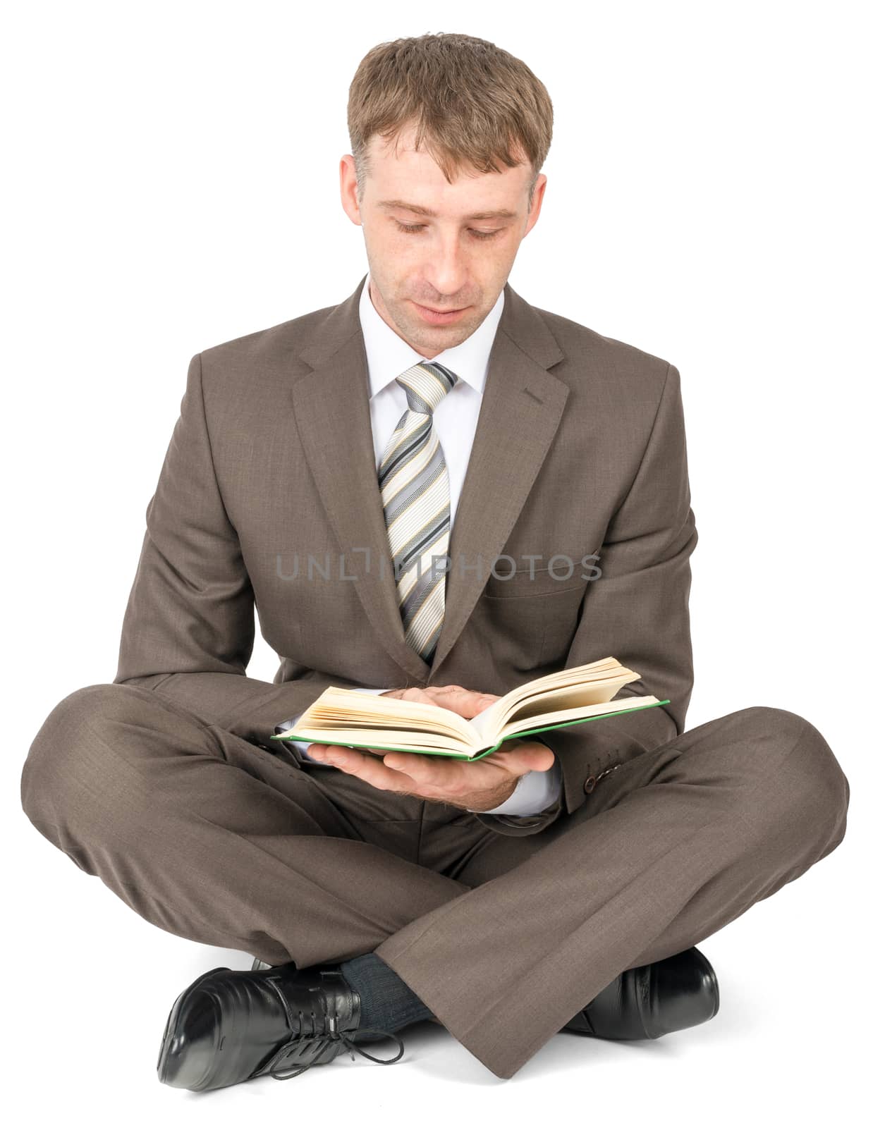 Man sitting and reading book isolated on white background