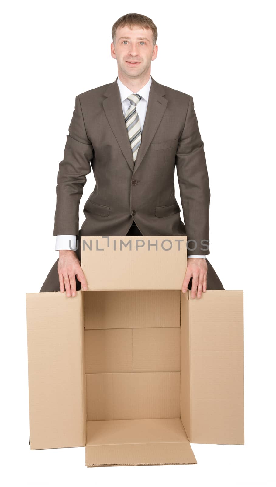 Business man holding empty box by cherezoff