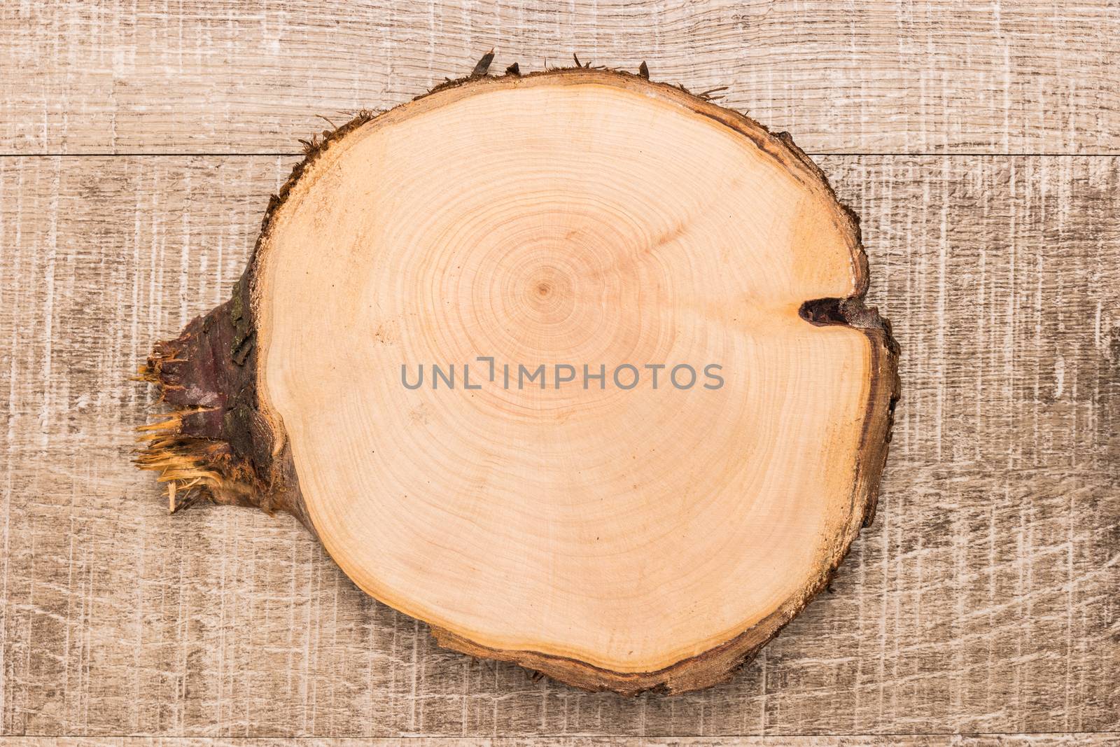 Wood plank board on wooden table, useful as a background. Top view with copy space.