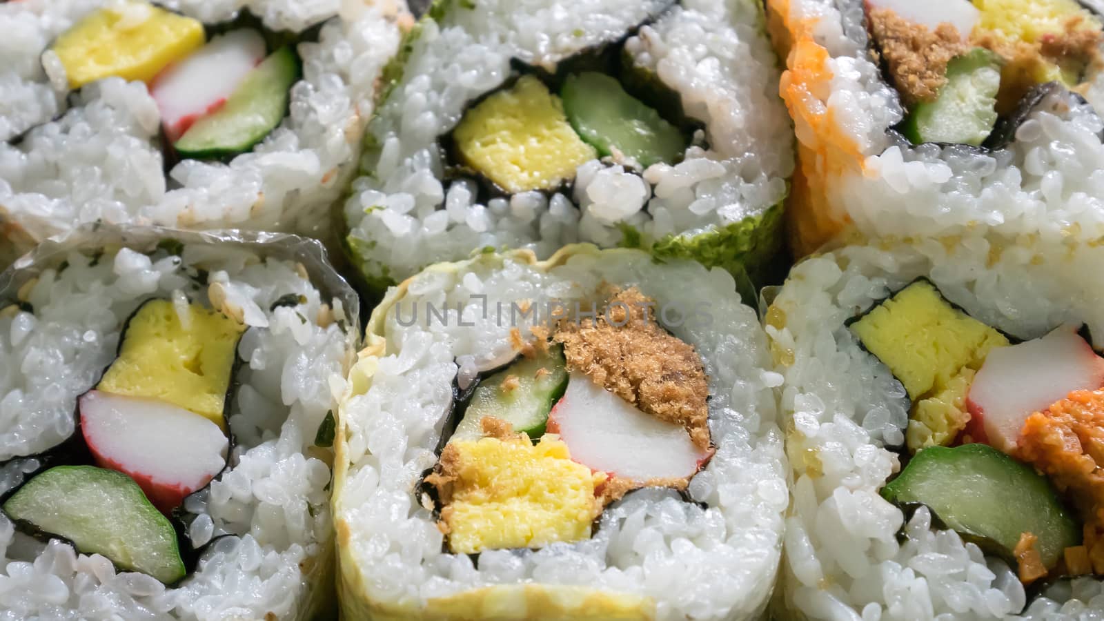 The close up of Japanese futomaki (sushi roll).