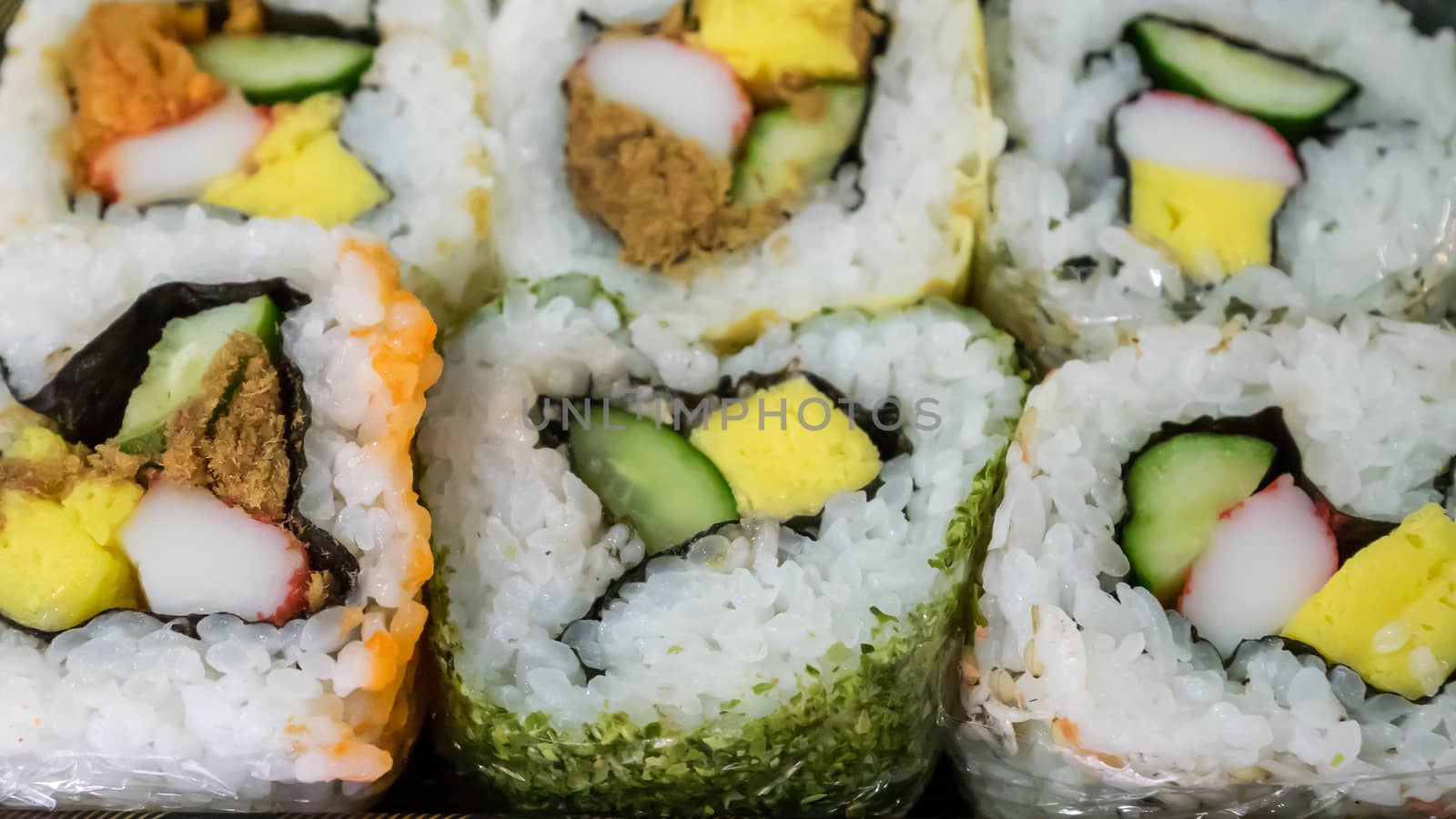 The close up of Japanese futomaki (sushi roll).