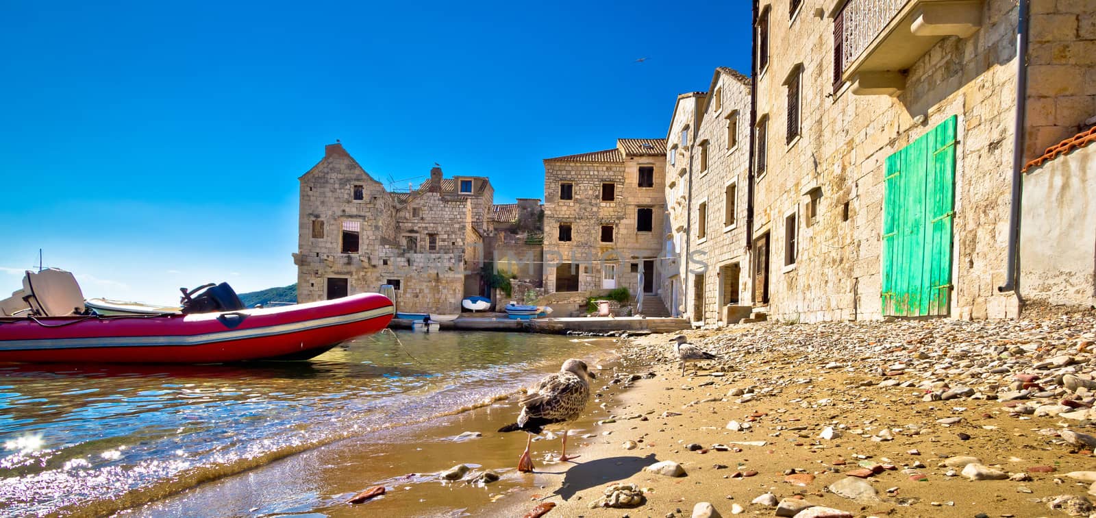 Stone houses on Komiza beach, Island of Vis, Croatia