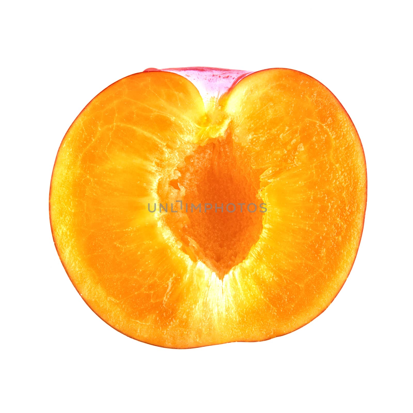Cut plum isolated on a white background