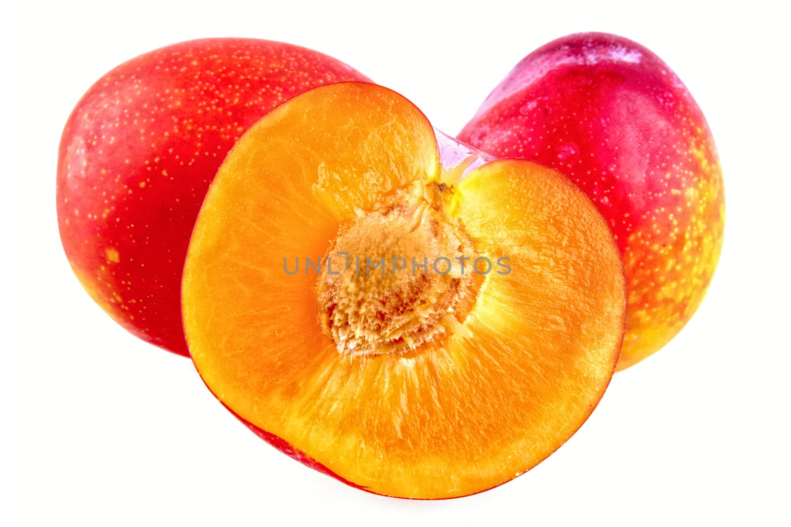 Group of plums isolated on a white background
