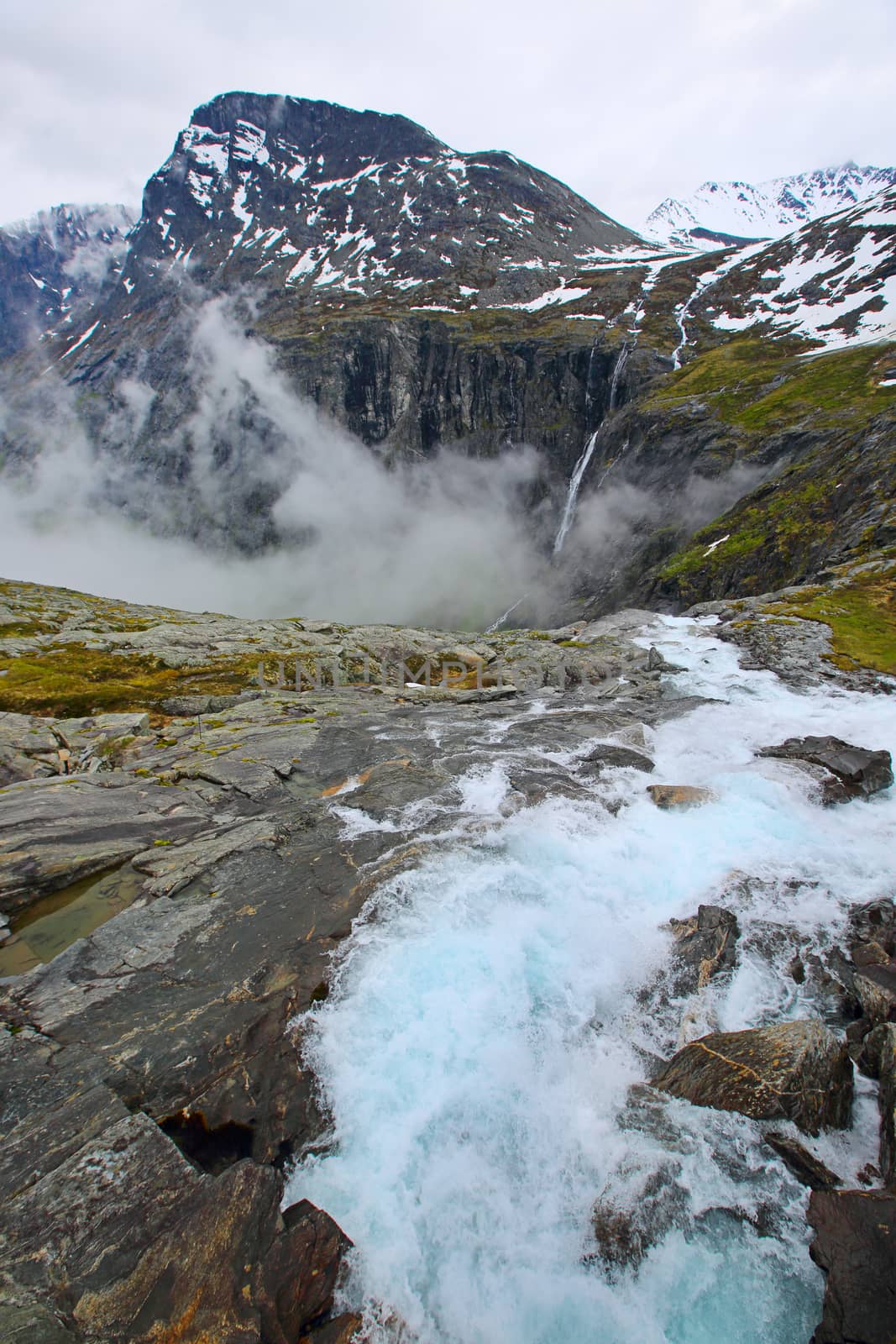 Beautiful mountain glacial river in high Norway mountains