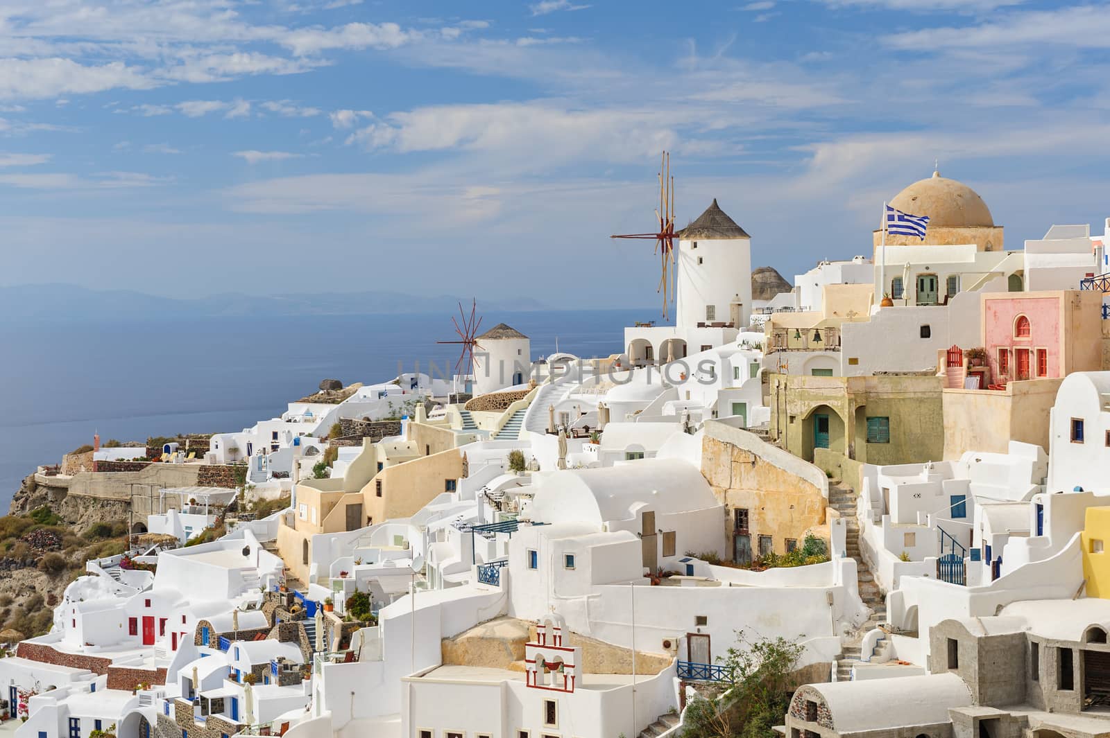 Oia in sunset rays at Santorini, Greece by starush