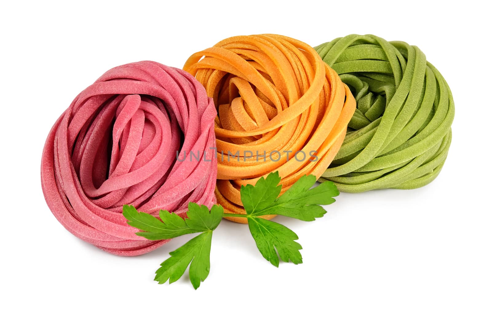 Colored fettuccine pasta and parsley. by leventina