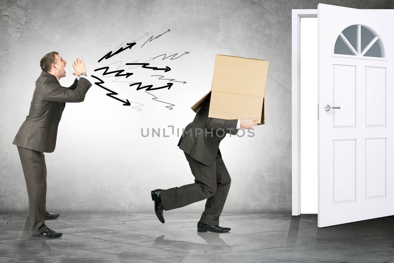 Business boss shouting to employee with box on his head and running away