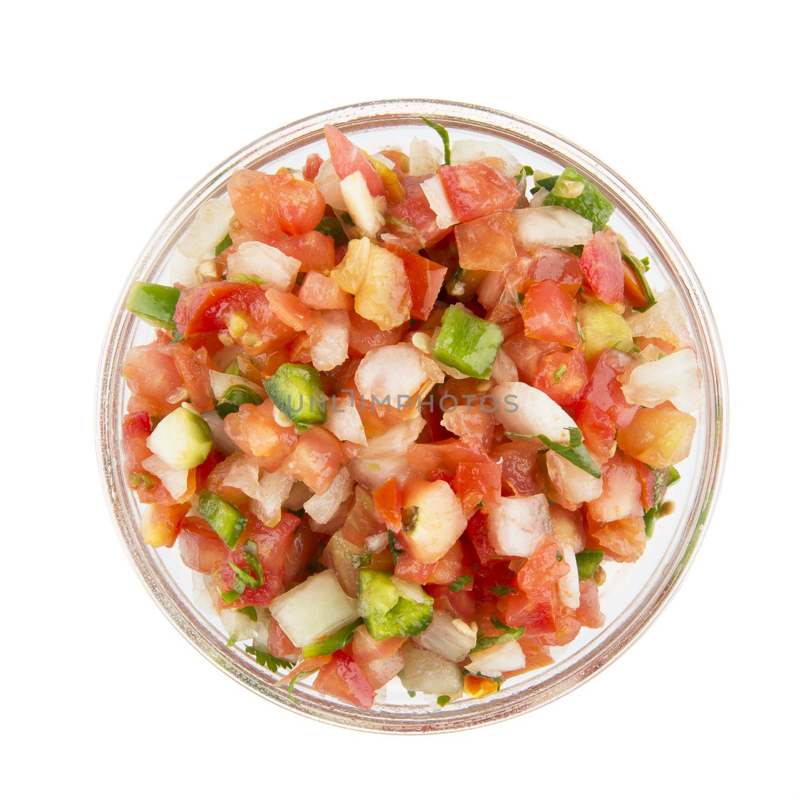 Bowl of fresh pico de gallo isolated on white and viewed from above.