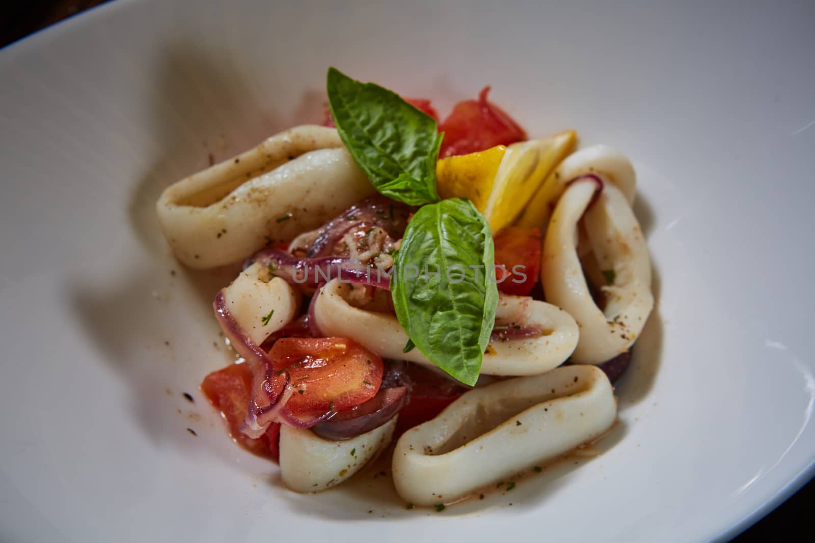 healthy rings squid salad with tomatoes by sarymsakov