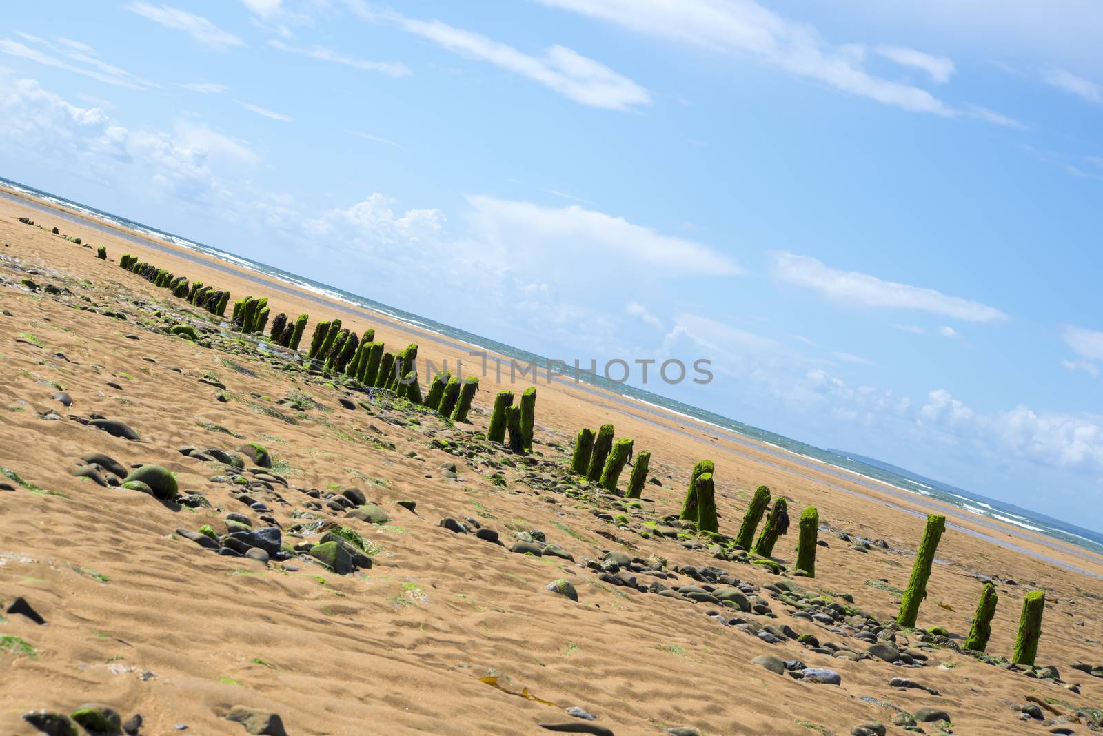 beautiful wave breakers at the mouth of the cashen on ballybunion beach on the wild atlantic way