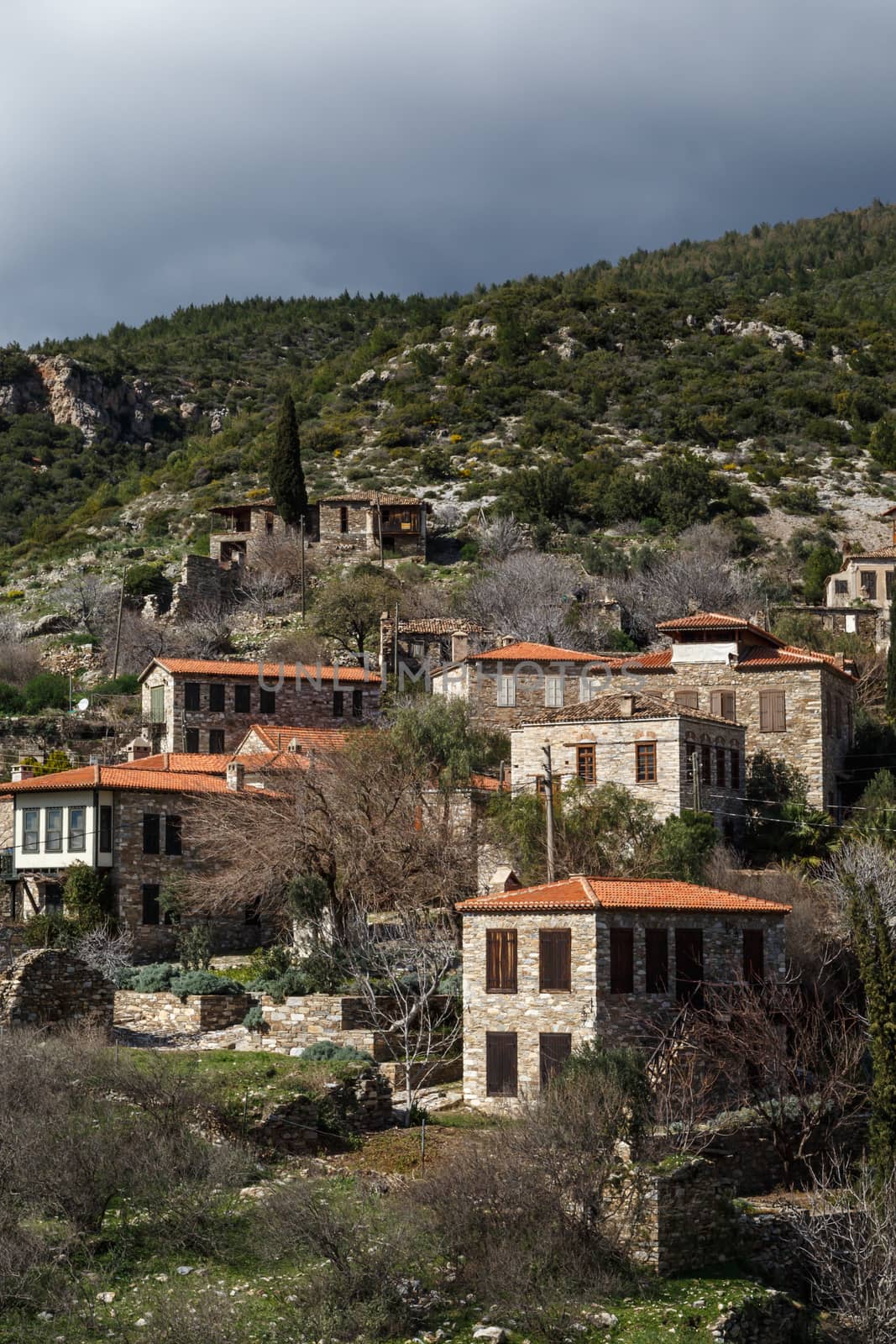 General view of historical Doganbeyli village in Aydin city in Turkey wit great landscape on cloudy sky background.