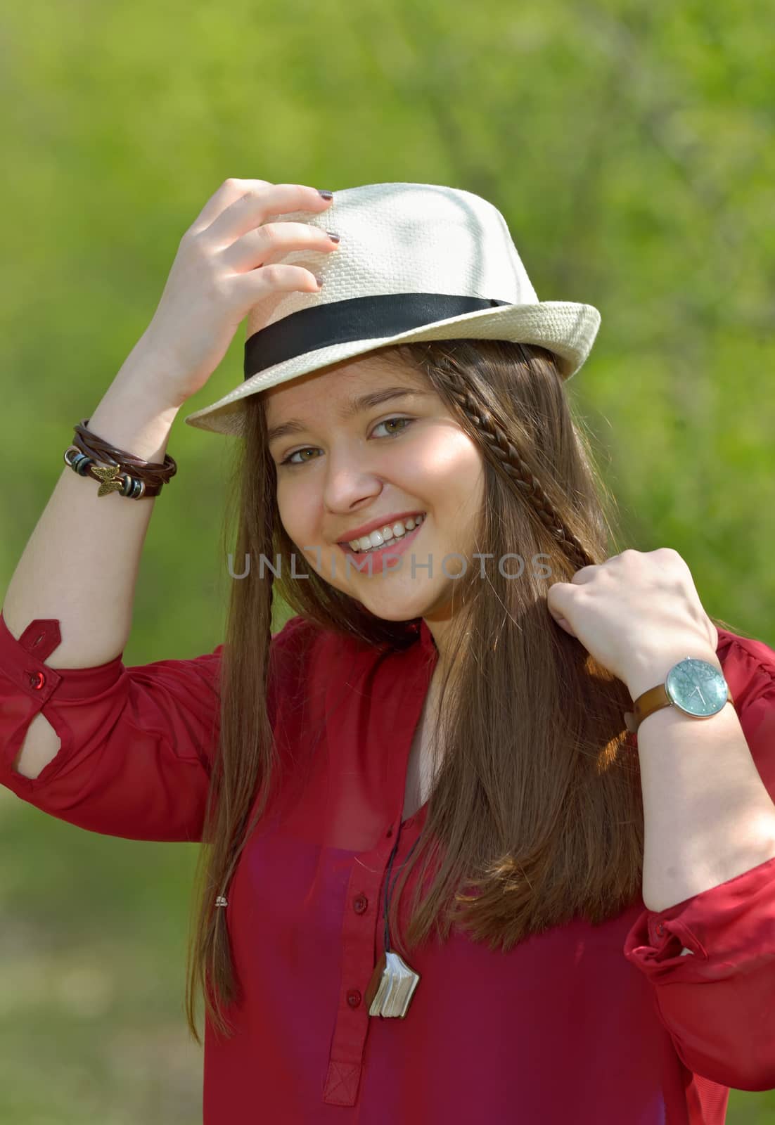 Portrait of teen girl in forest in spring time