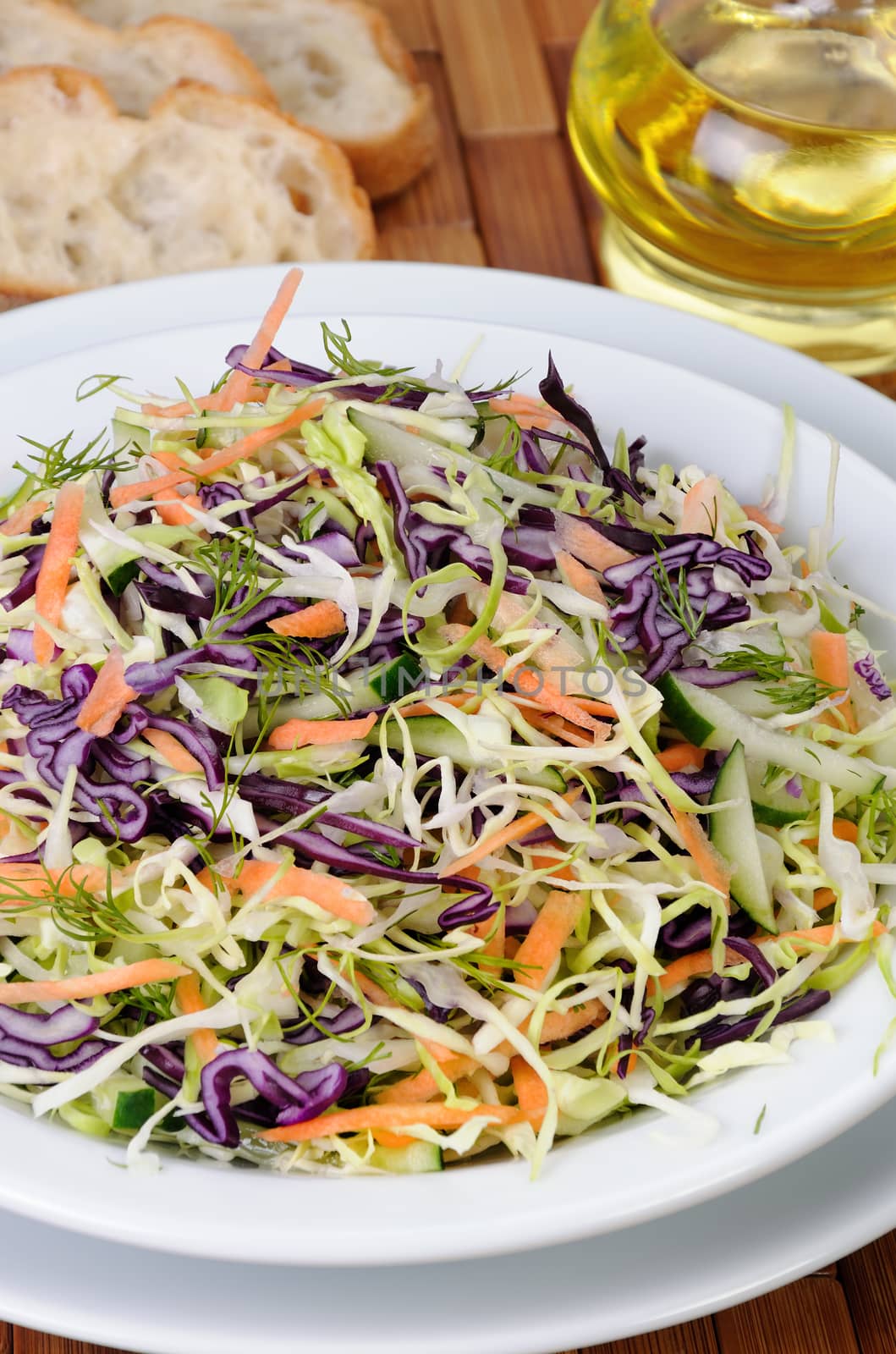 Salad   coleslaw red and white cabbage with carrots and cucumber