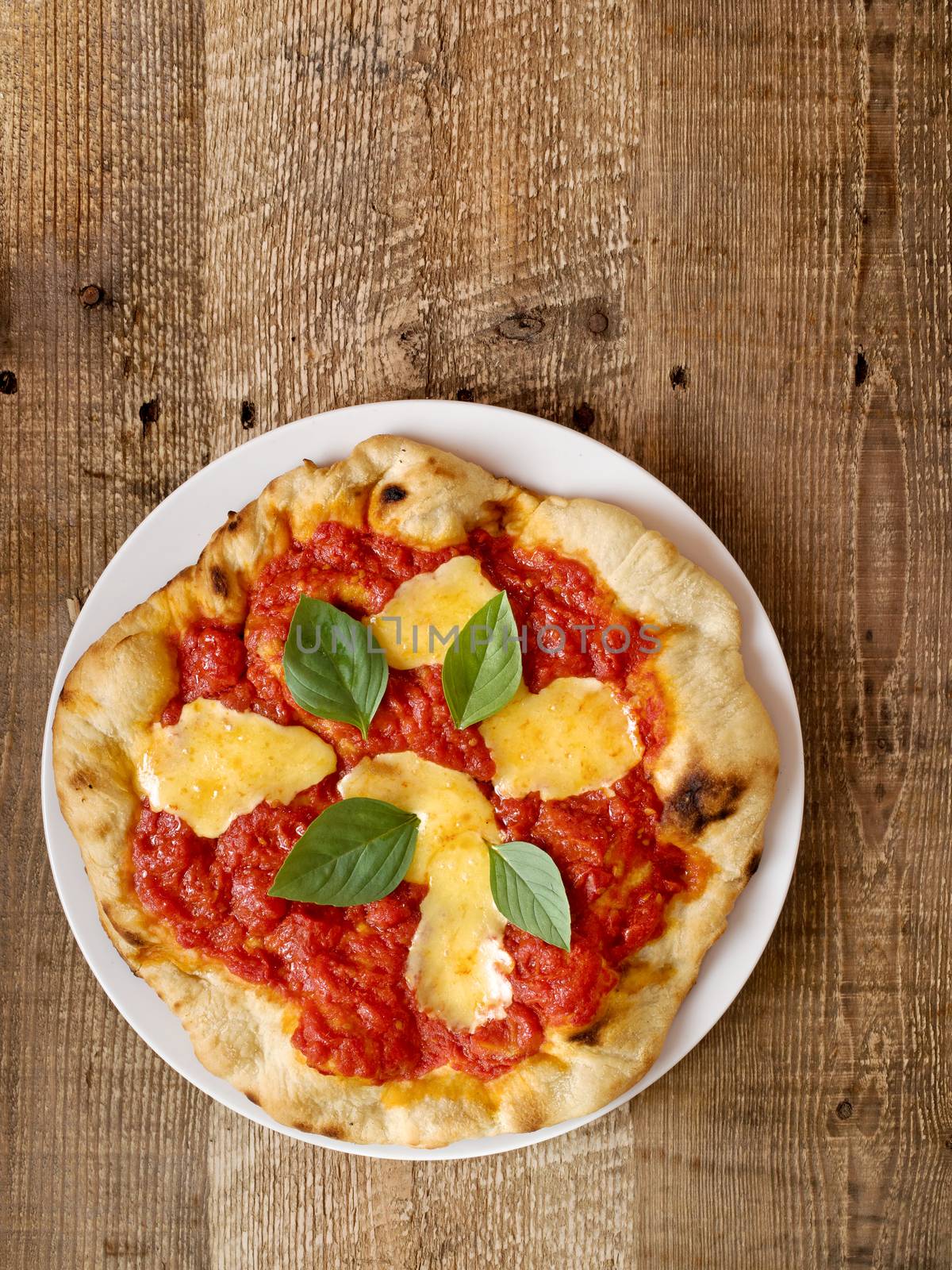 close up of rustic italian pizza margherita