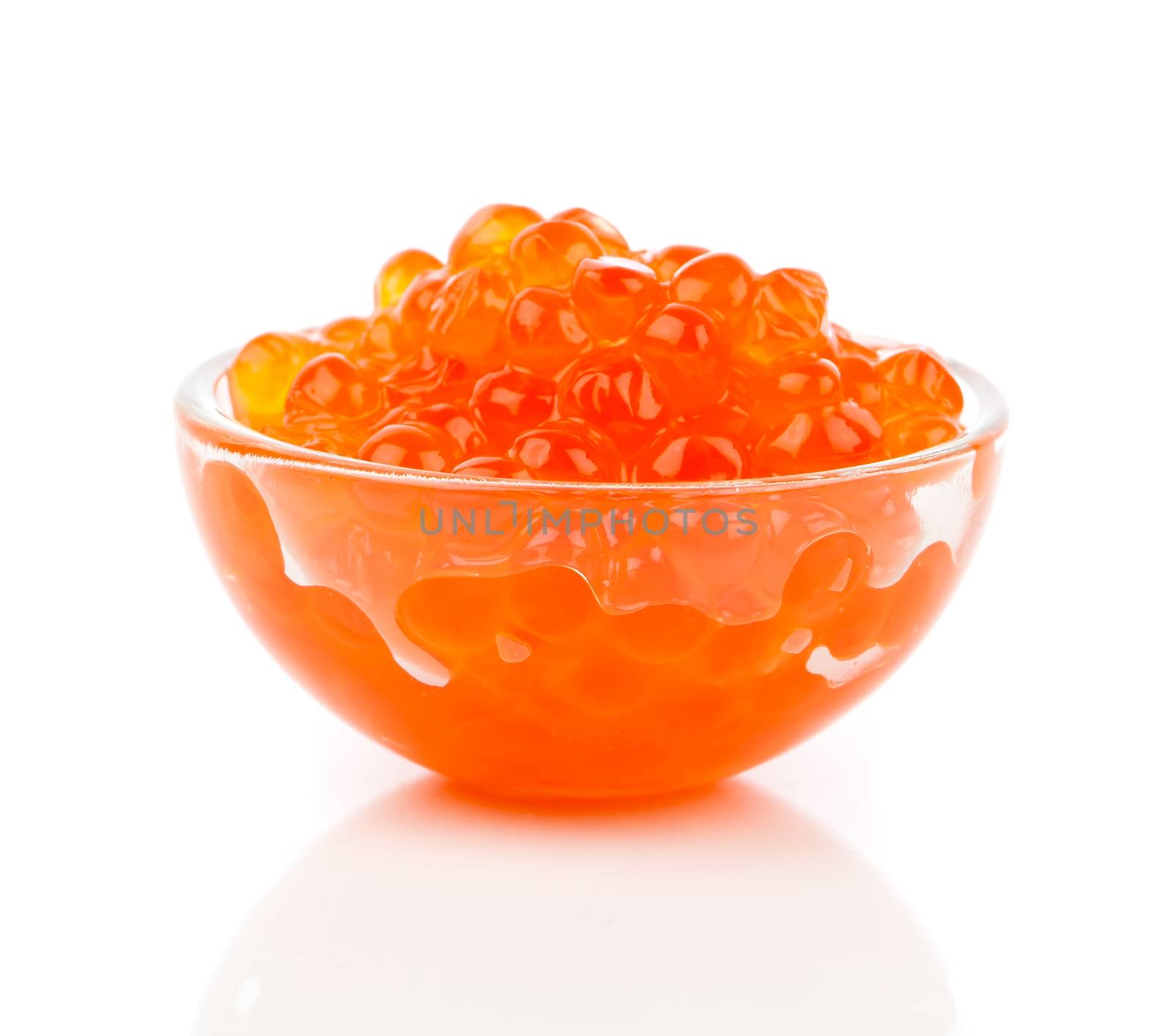 Red caviar in the glass bowl isolated on a white background. by motorolka
