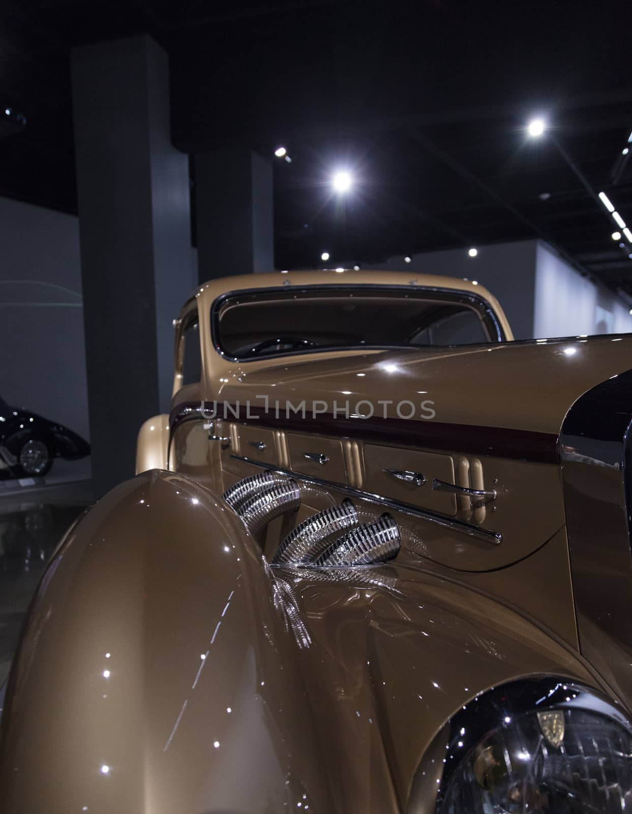 Los Angeles, CA, USA — April 16, 2016: Gold 1937 Delage D8-120 Coupe Aerosport by Letourneur et Marchand at the Petersen Automotive Museum in Los Angeles, California, United States. Editorial use