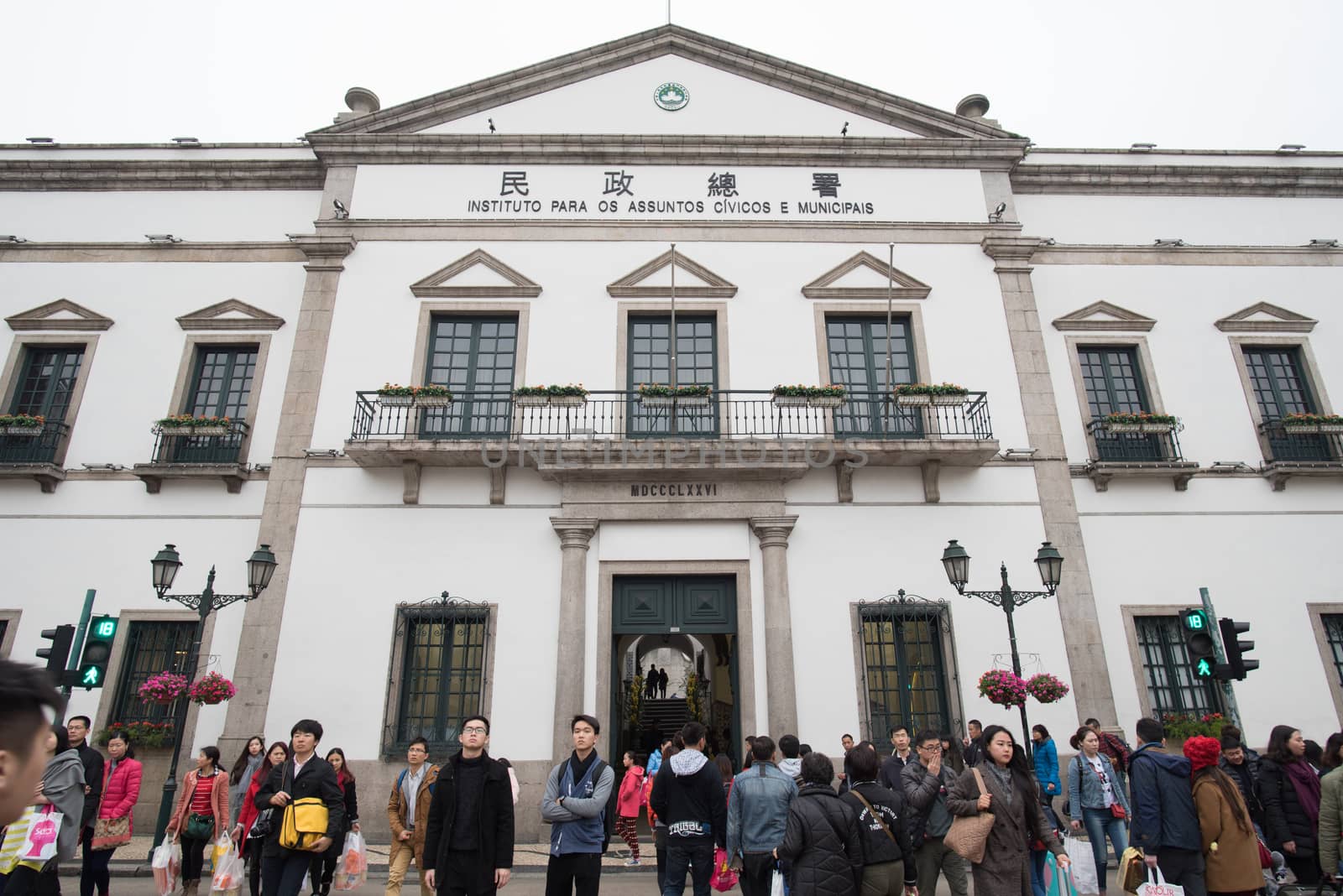 Macau - March 12, 2016 :  People walking around Civic and Municipal Affairs Bureau (IACM) on Mar 12, 2016 in Macau.