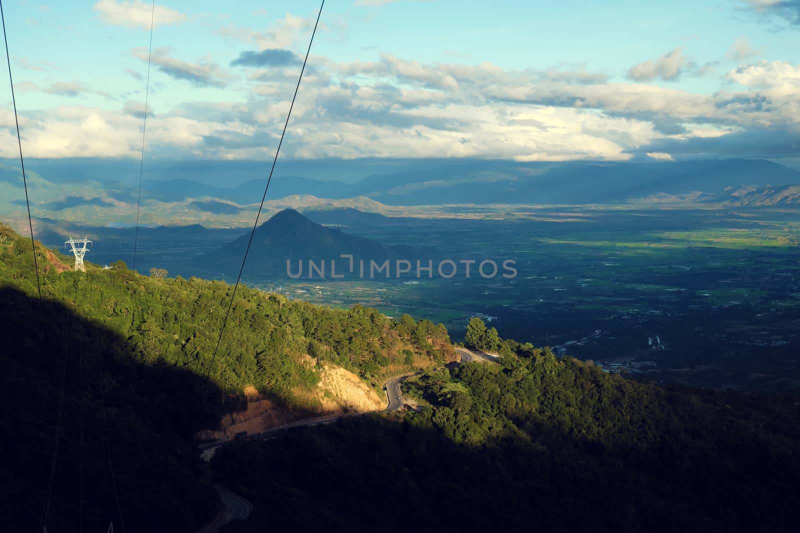 Amazing landscape of Ngoan Muc mountain pass, a dangerous road link Phan Rang with Dalat of Vietnam, beautiful scene with mountain terrain among forest in evening