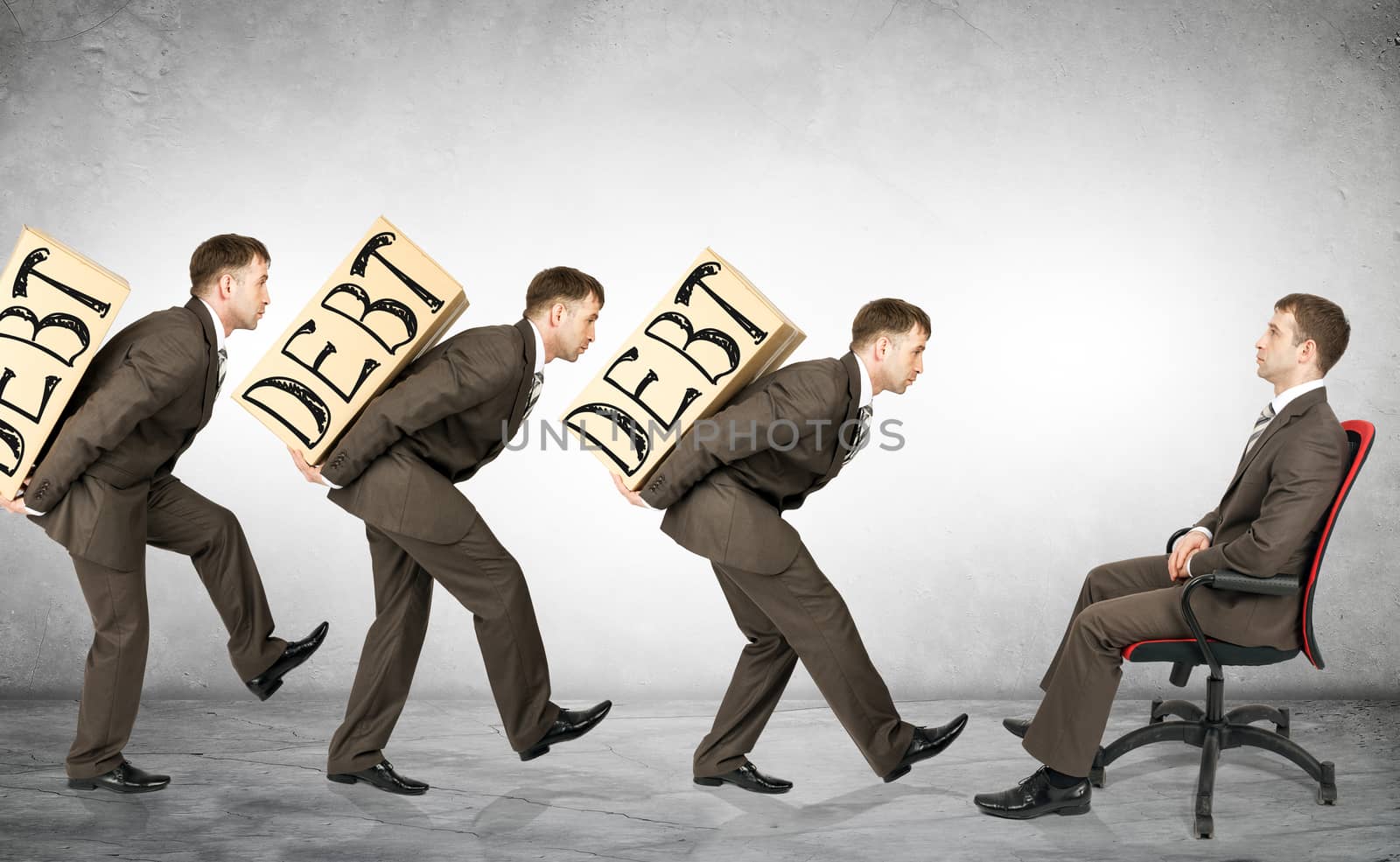 Businessmen carry boxes with word debt to boss