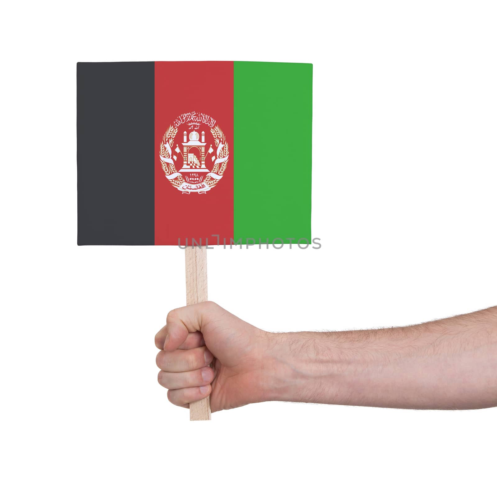 Hand holding small card, isolated on white - Flag of Afghanistan