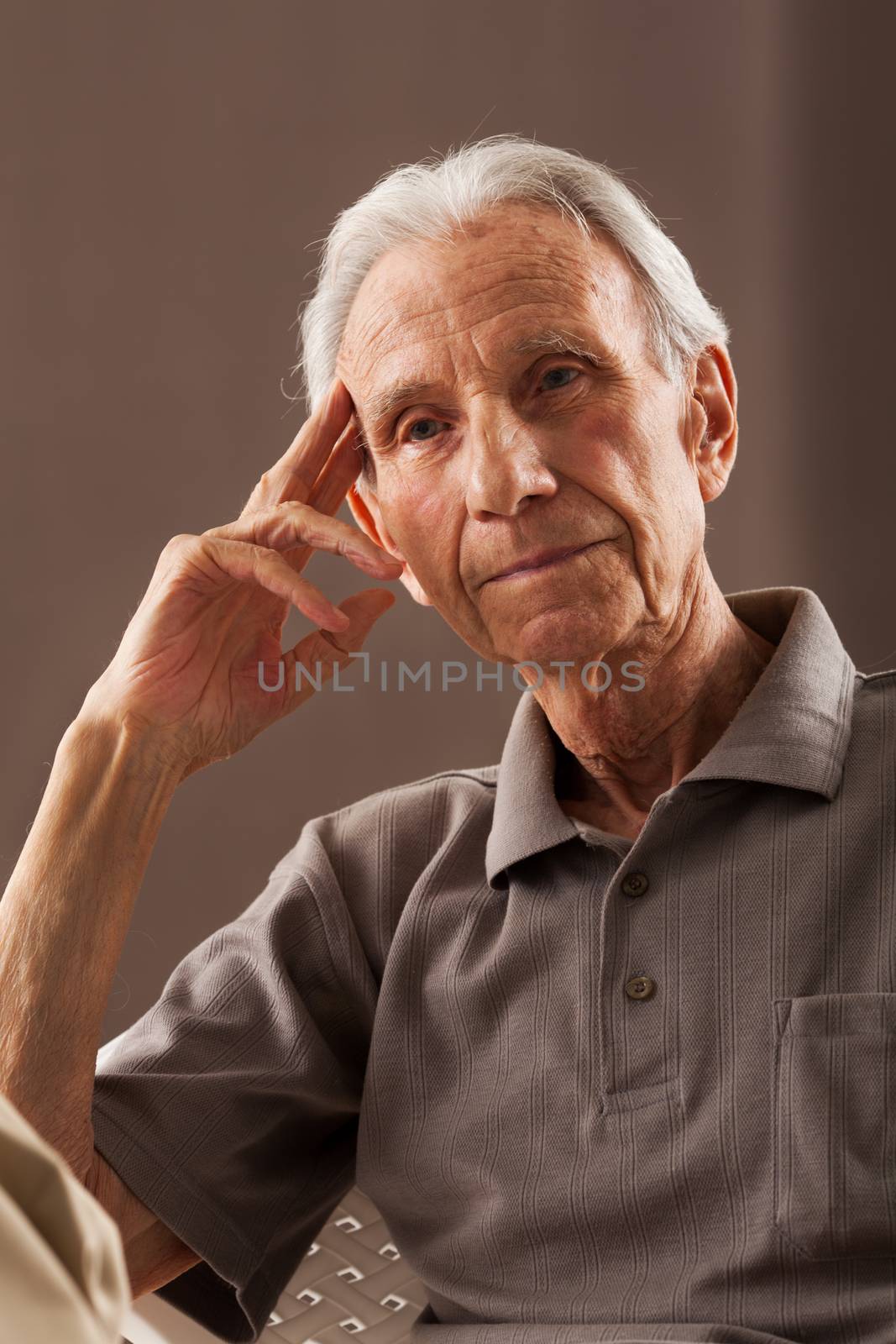 Elderly senior men sitting and thinking about old times