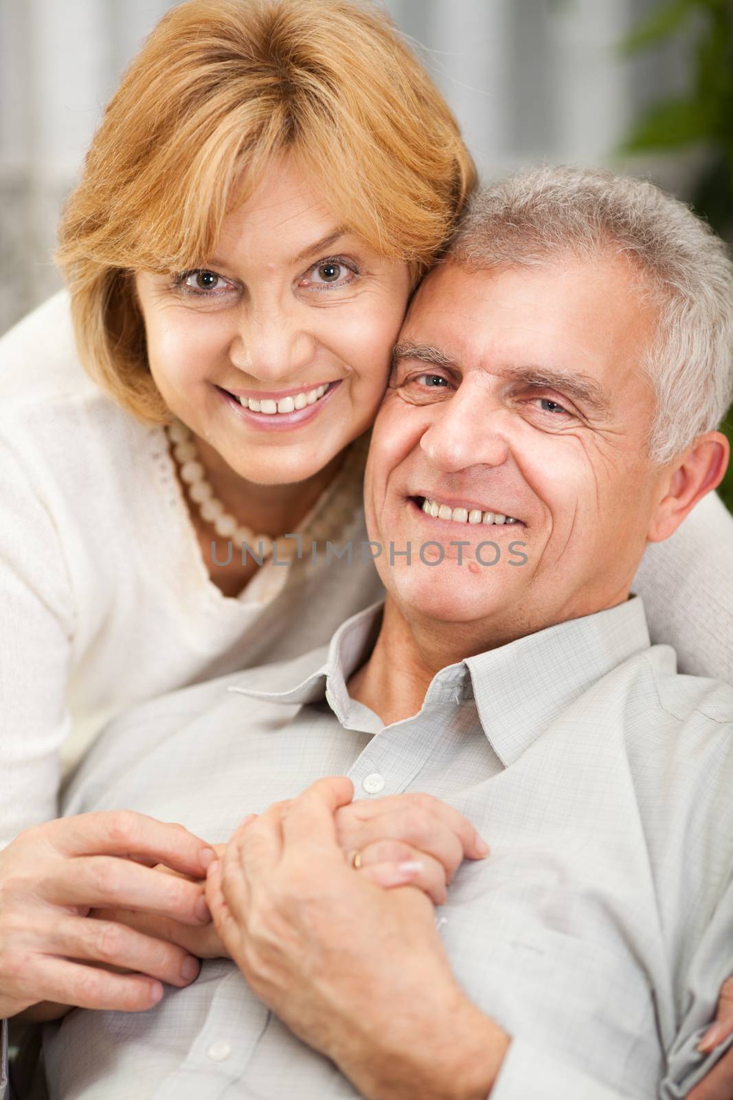 Portrait of happy senior couple in love