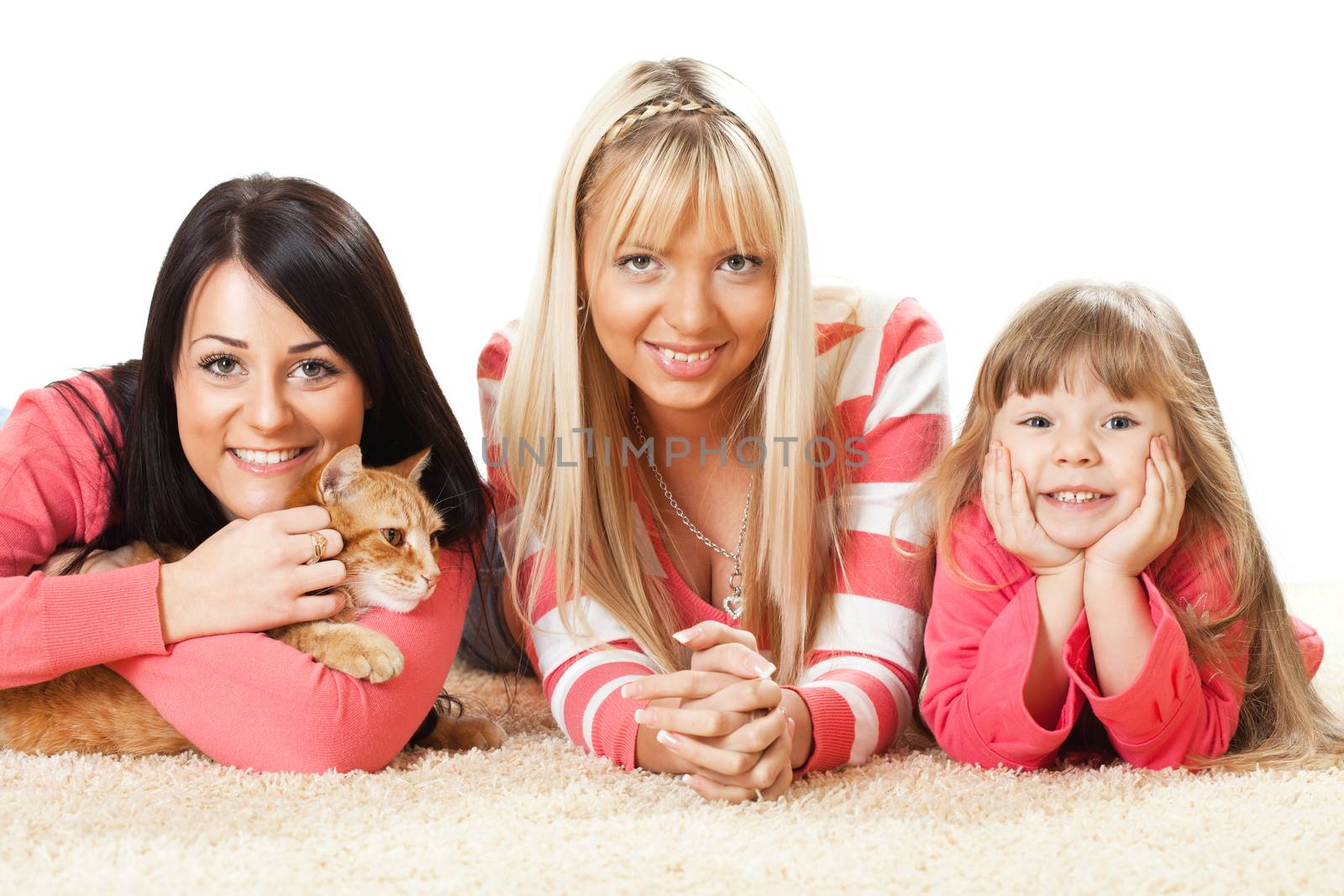 Beautiful girls and cat enjoying at home