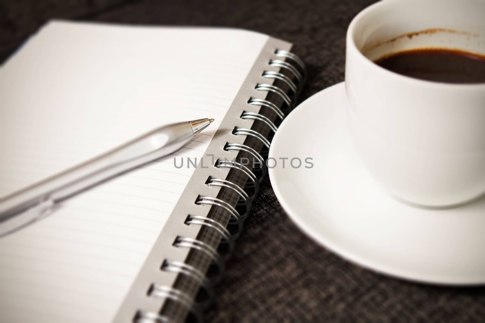 Coffee cup, notebook and pen by MilanMarkovic78