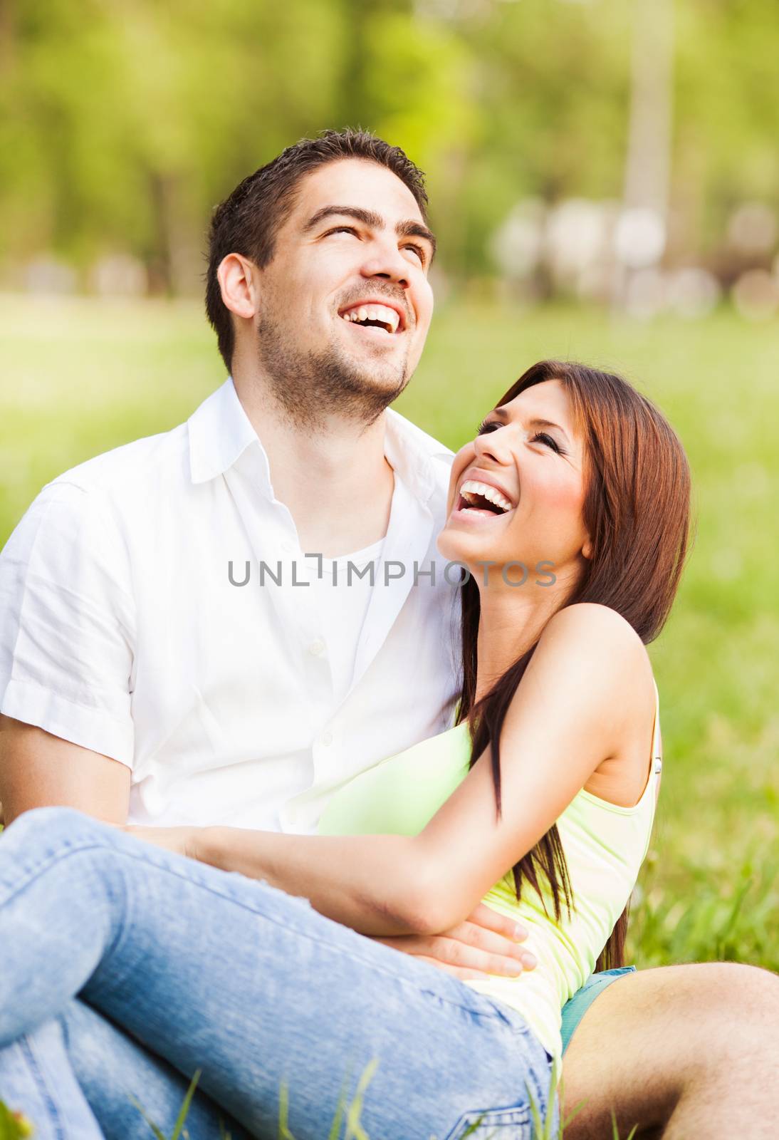 Happy couple enjoying in the park