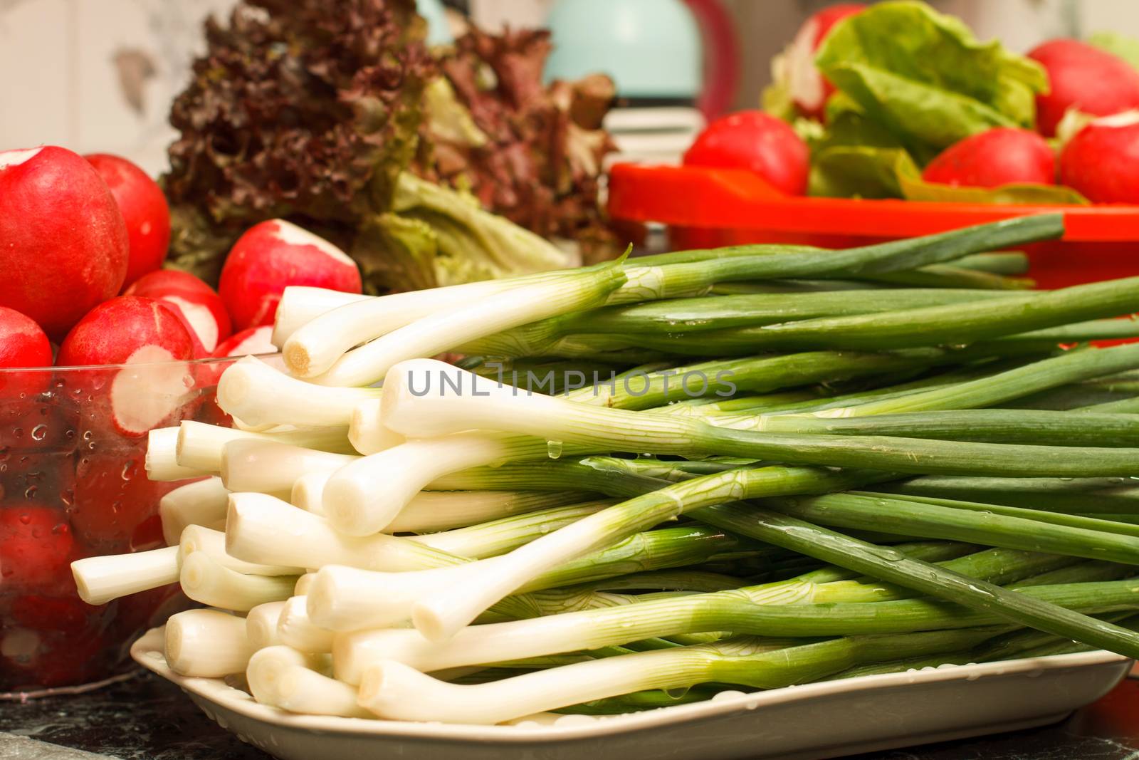 Washed fresh vegetables in kitchen