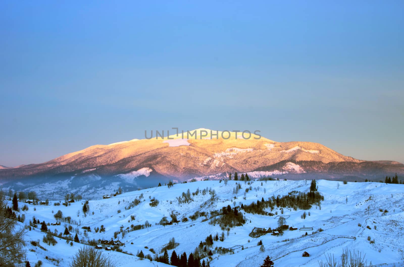 Carpathian mountain valley covered with fresh snow. Majestic lan by dolnikow